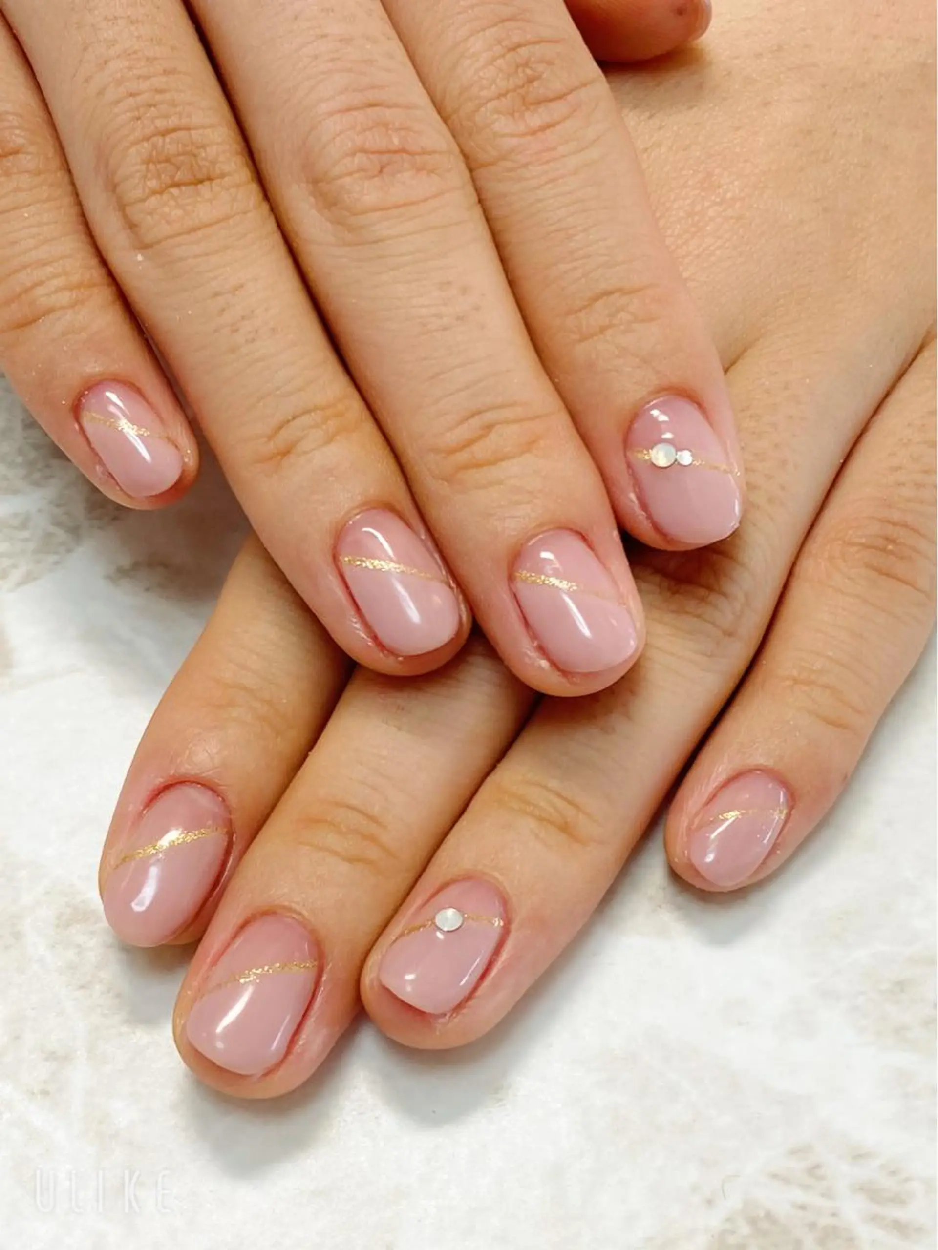 ネイル ゴールド ピンク ストーンネイル プティリボン 武蔵小金井店のネイルデザイン
