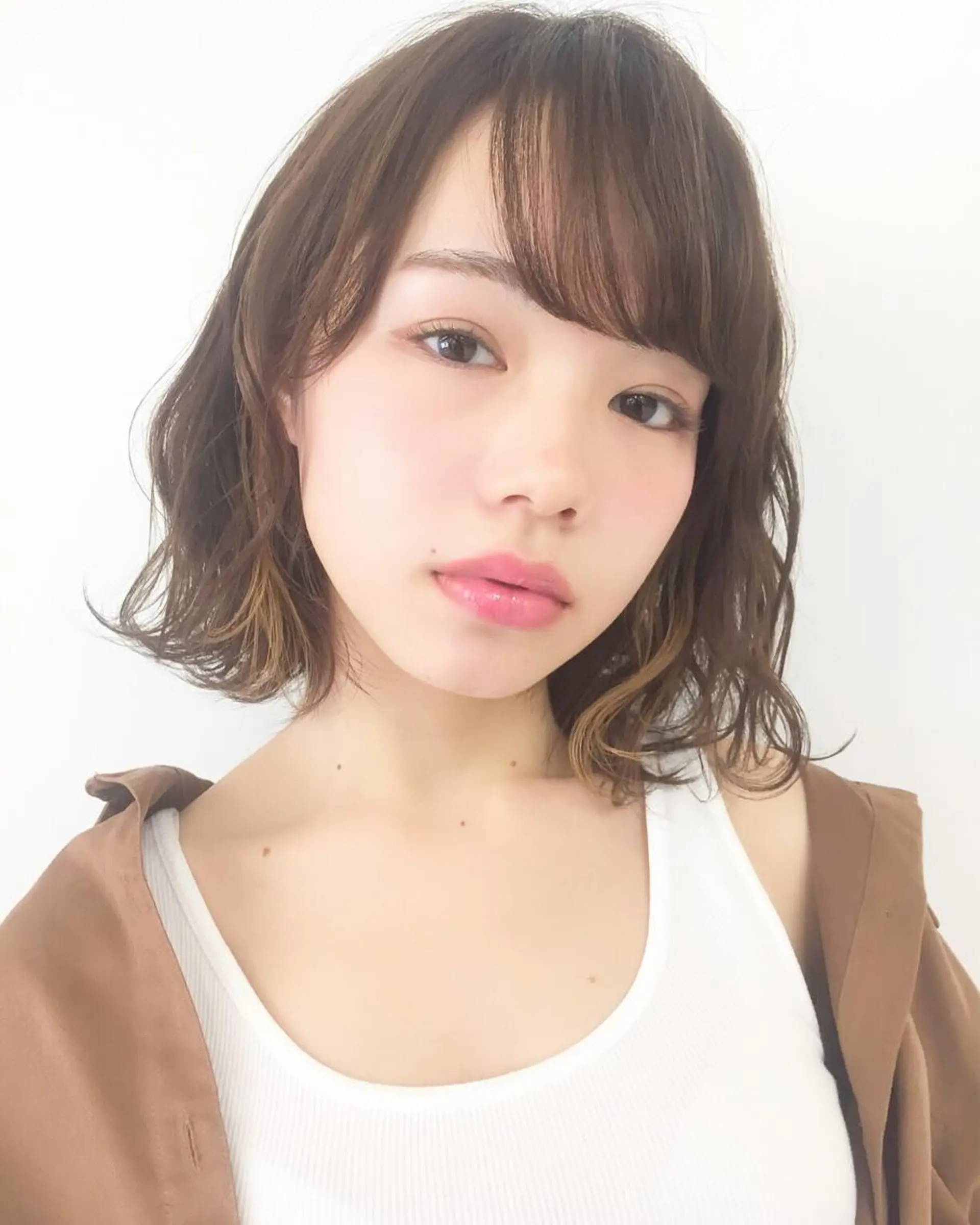 ミディアム パーマ ボブ 齋藤 咲のヘアスタイル