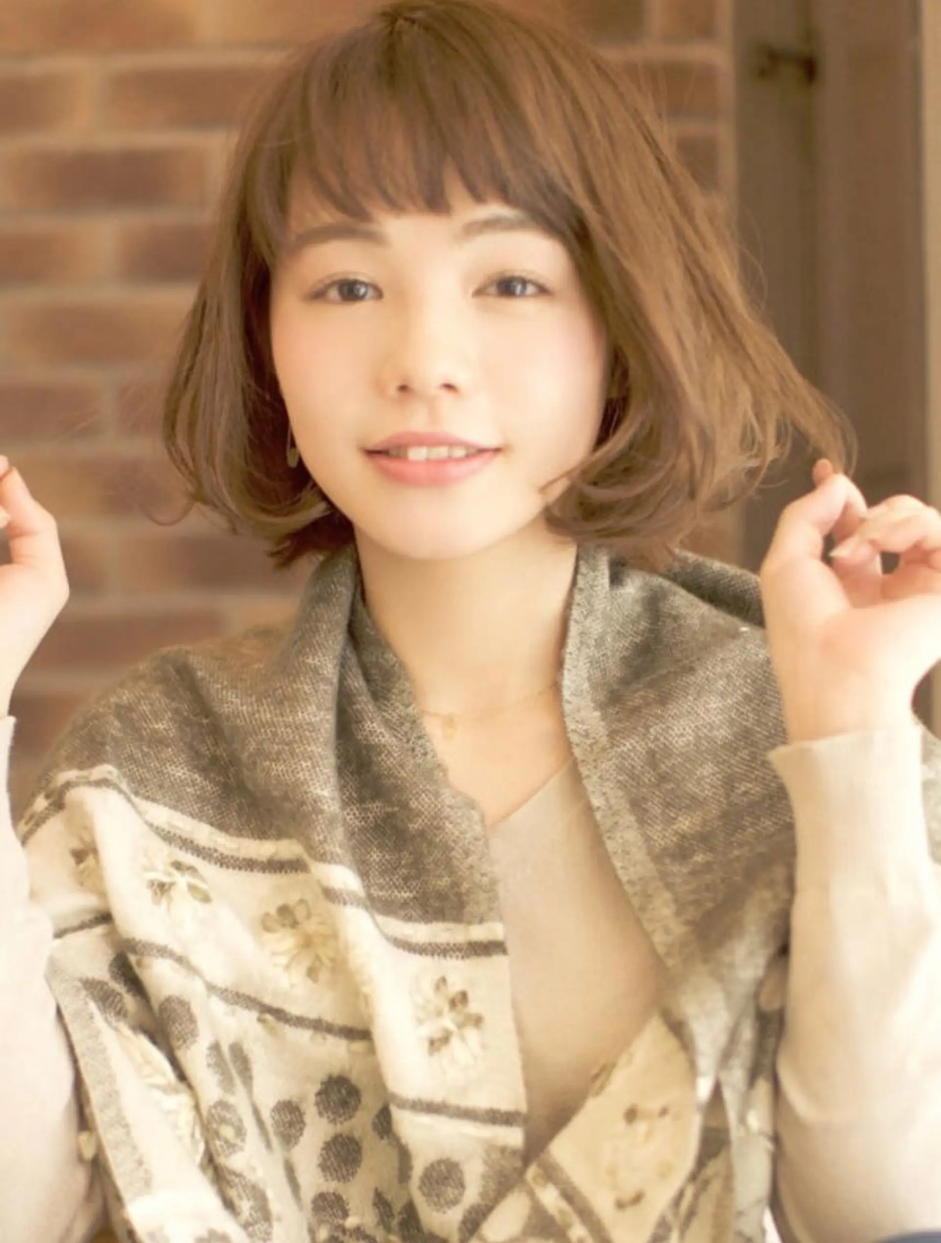 ミディアム パーマ 佐々木 里菜のヘアスタイル