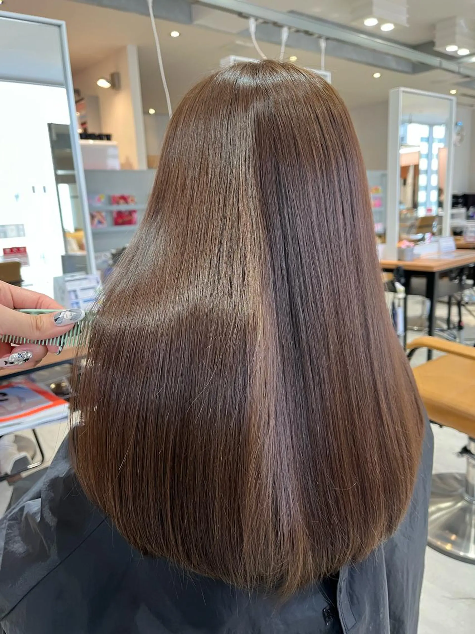 ロング カット ヘアカラー トリートメント u n aのヘアスタイル