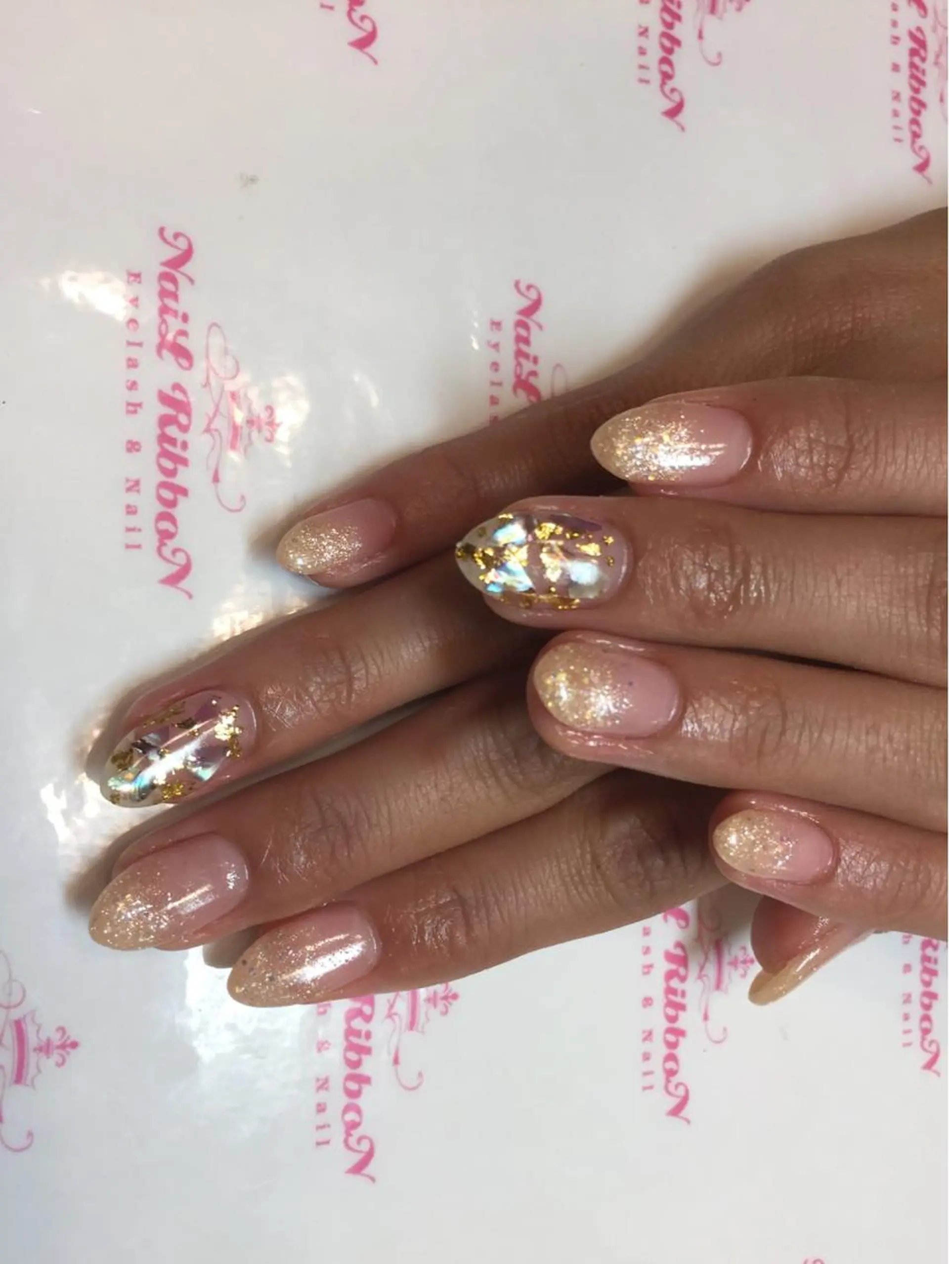 ネイル ネイルリボン 受付スタッフのネイルデザイン