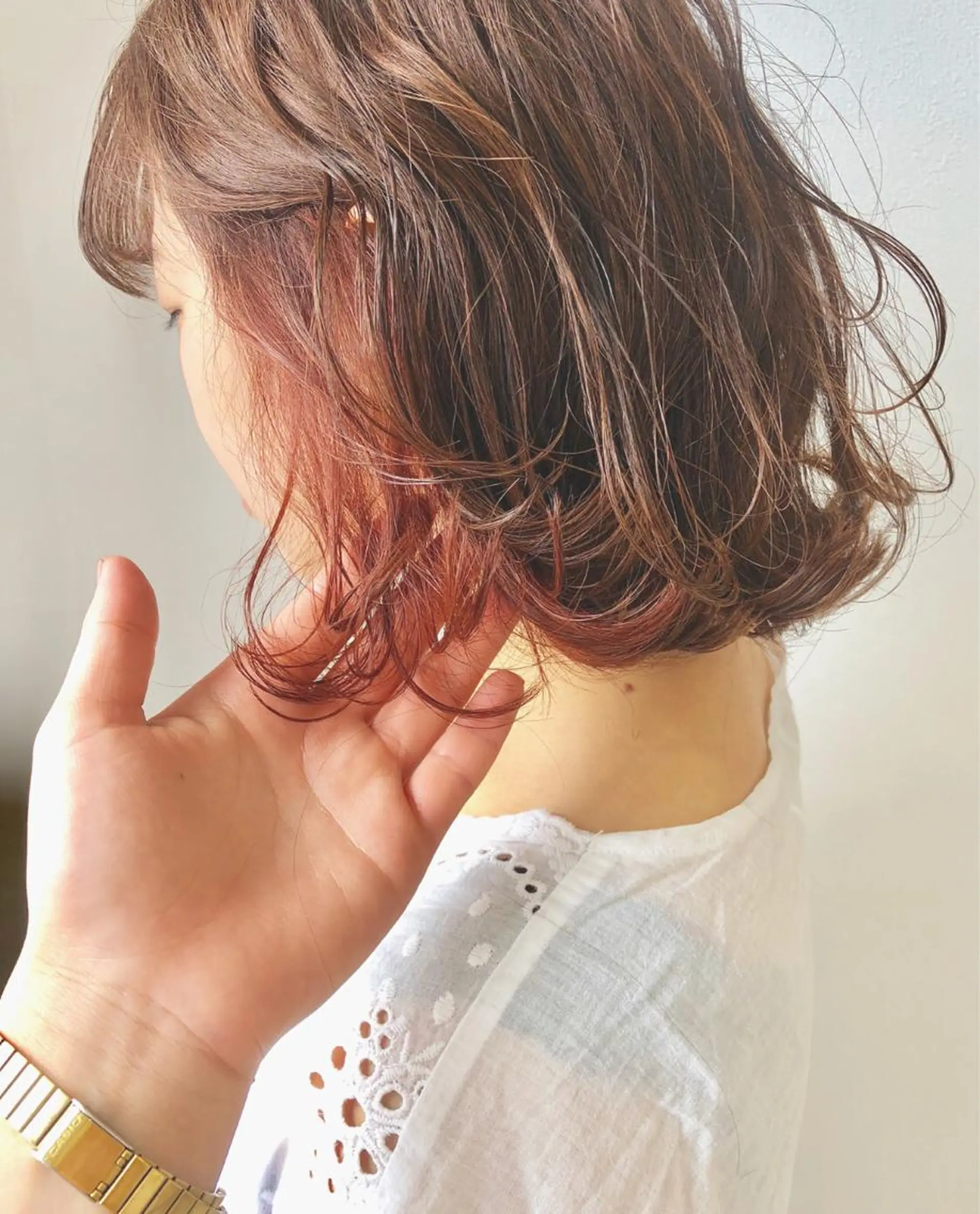 ミディアム カラー オレンジ 岩田 萌那のヘアスタイル