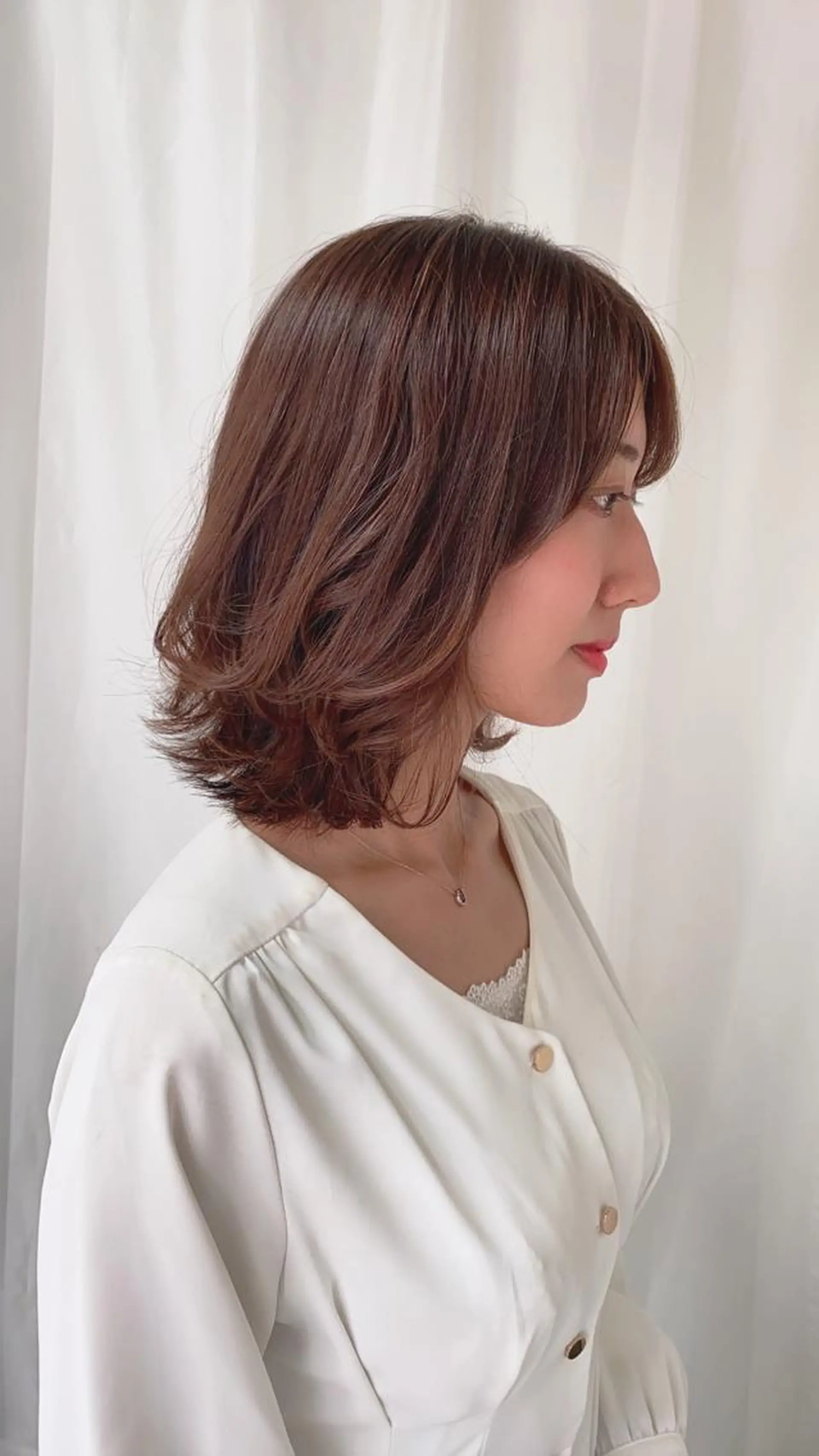 ミディアム 外ハネヘア パーマ・レイヤー 髪質改善・TANIのヘアスタイル