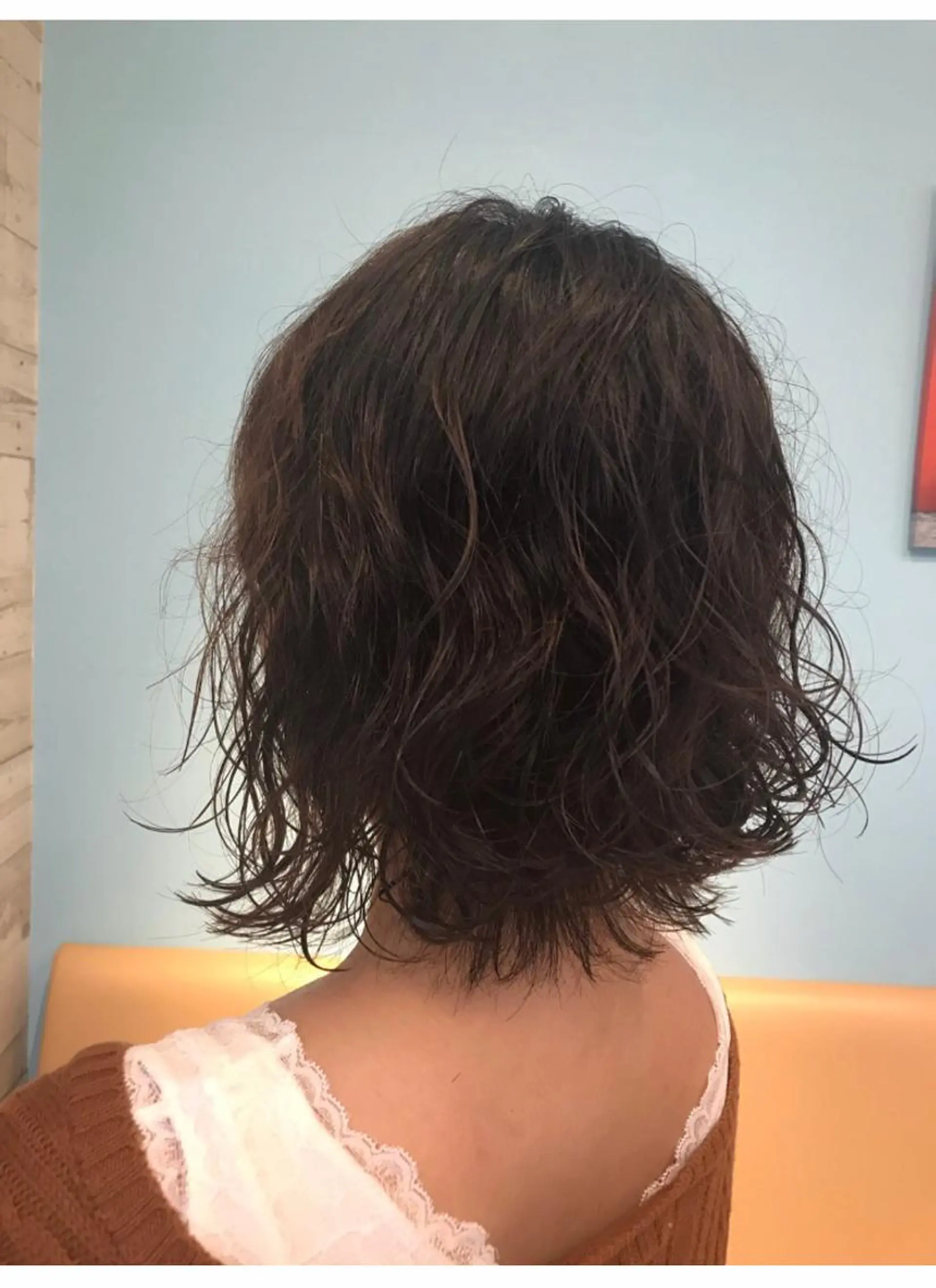 ミディアム パーマ 関 桃子のヘアスタイル