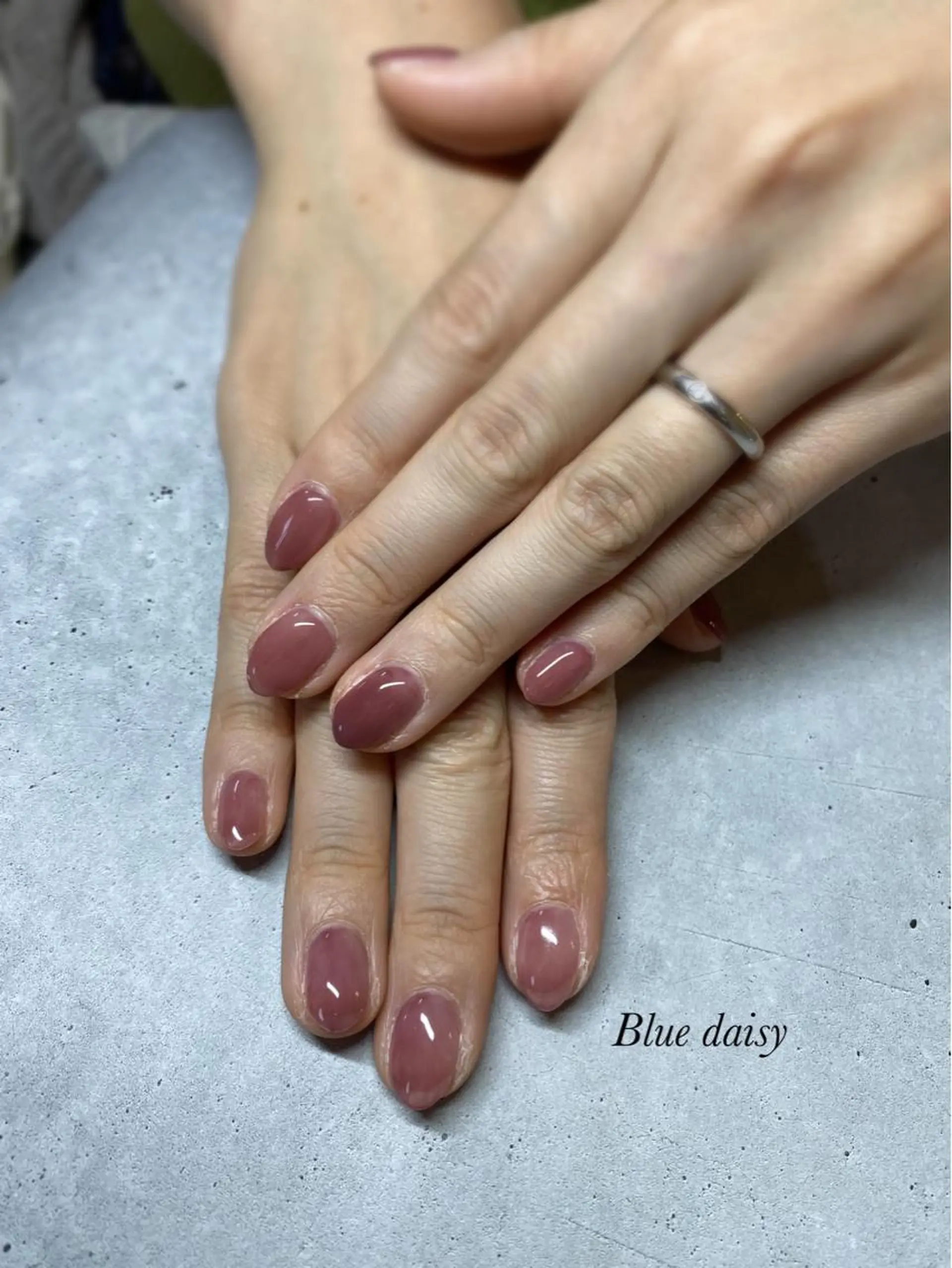 ネイル ワンカラーネイル パープル ハンドネイル Blue daisy 栄本店のネイルデザイン