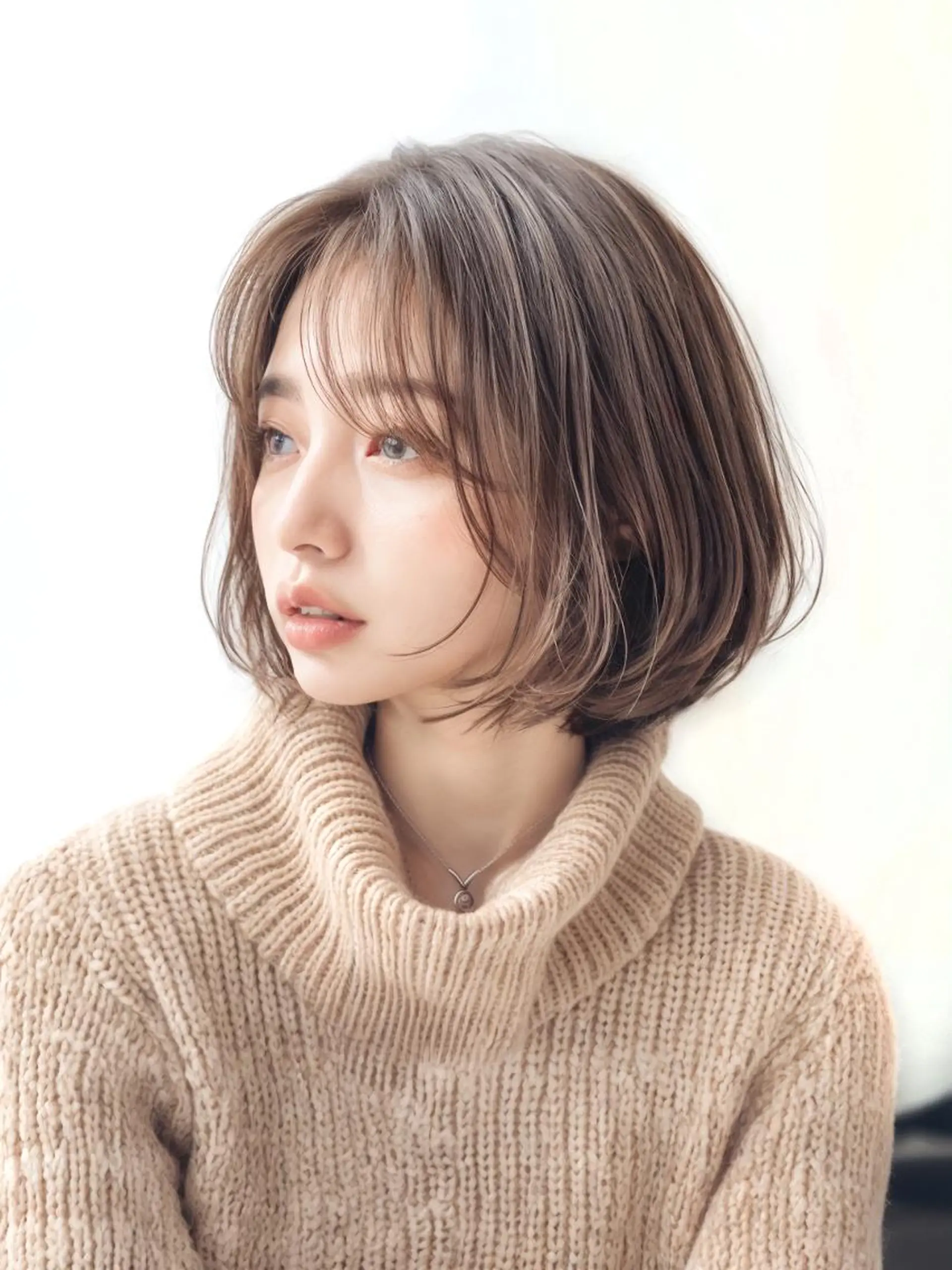 ミディアム HITOMI .のヘアスタイル