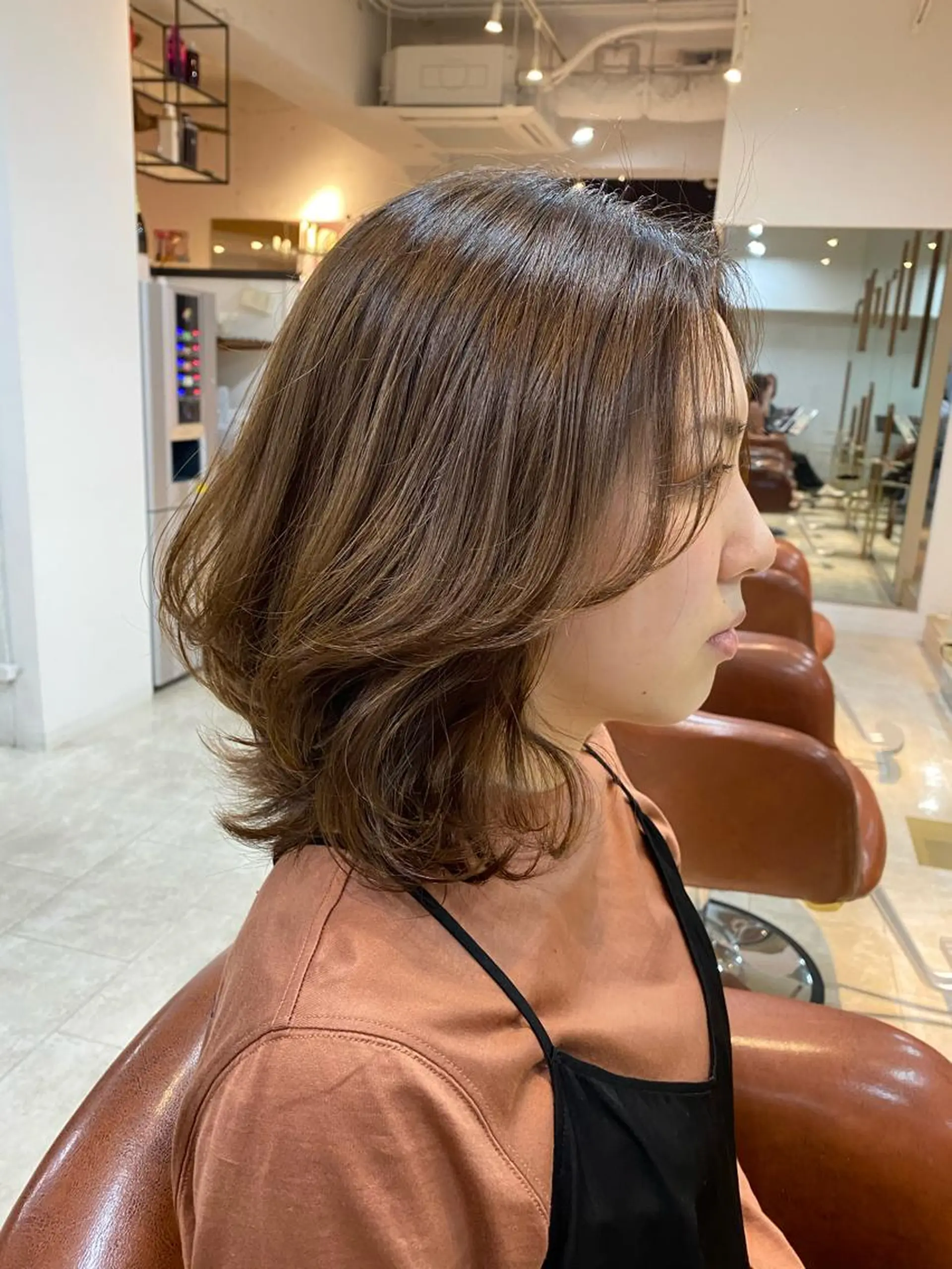 ミディアム 天使の羽バング・フェザーバング ORO　飯田 早稀のヘアスタイル