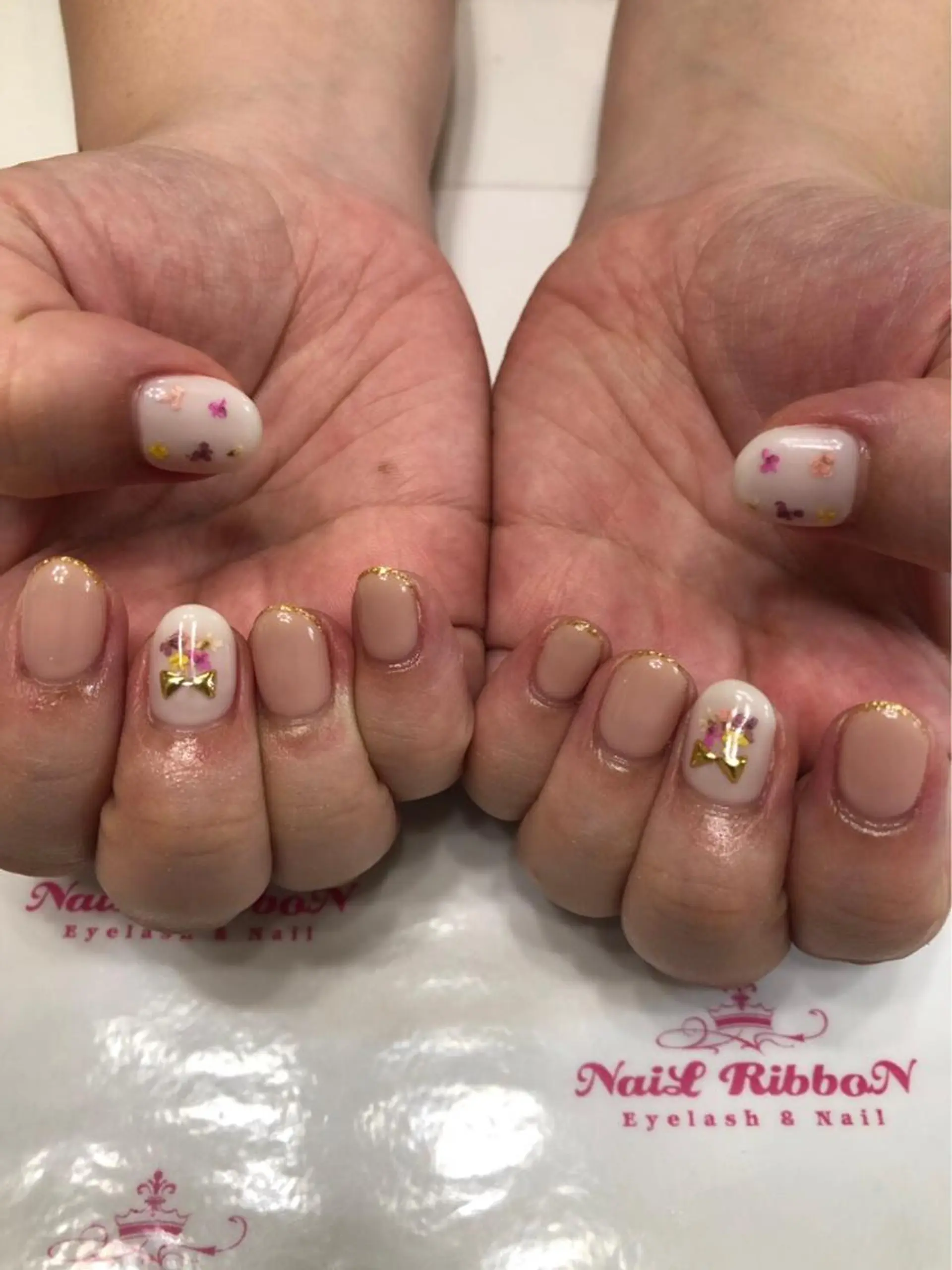ネイル 春ネイル ネイルリボン 受付スタッフのネイルデザイン