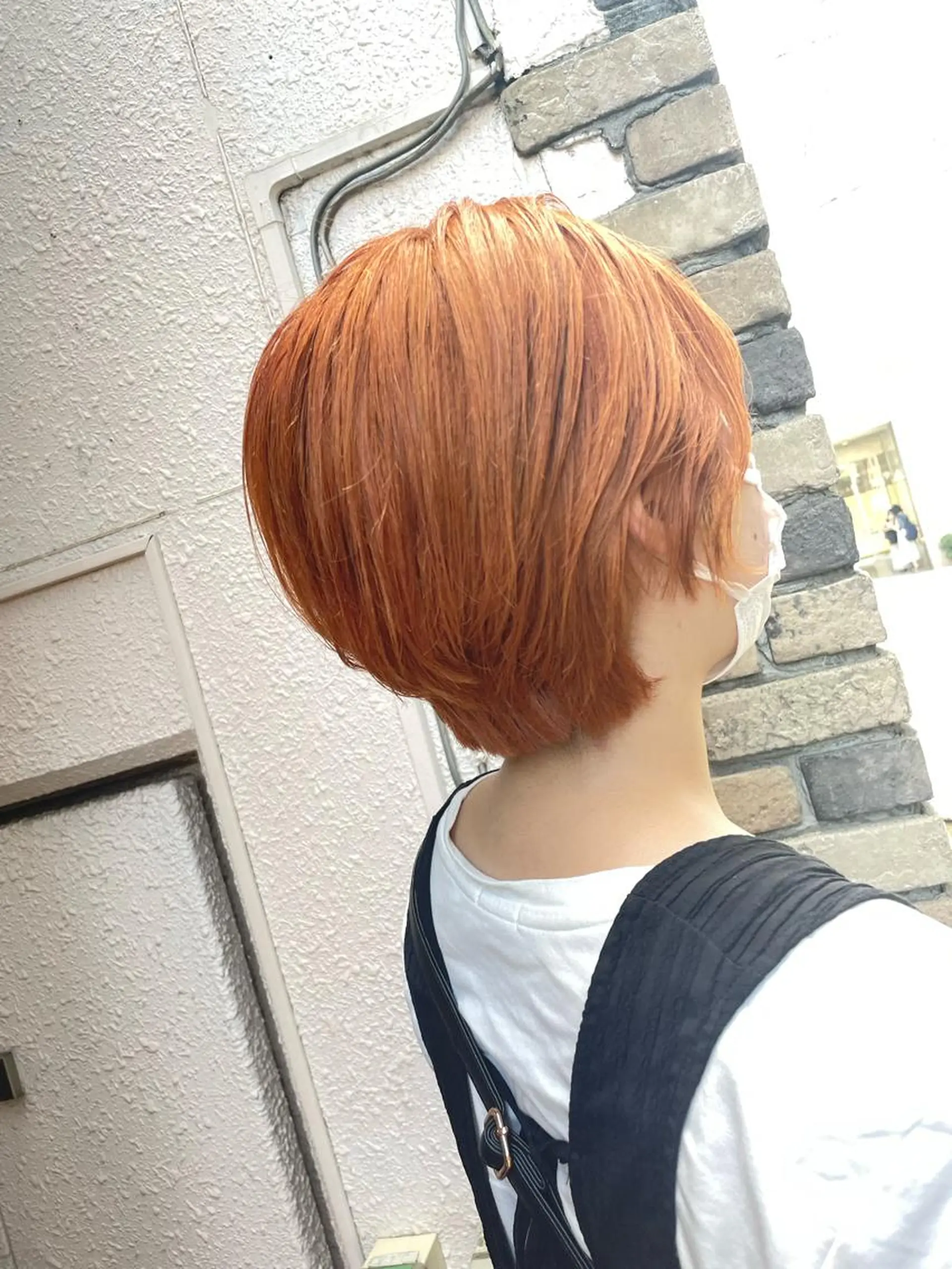 ショート カラー ブリーチ ケアカラー デザインカラー オレンジ 髪質改善 sato manamiのヘアスタイル