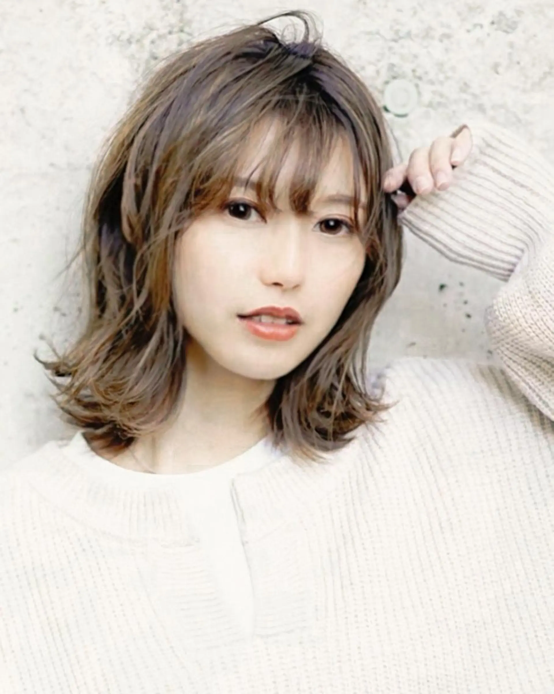 ミディアム HITOMI .のヘアスタイル