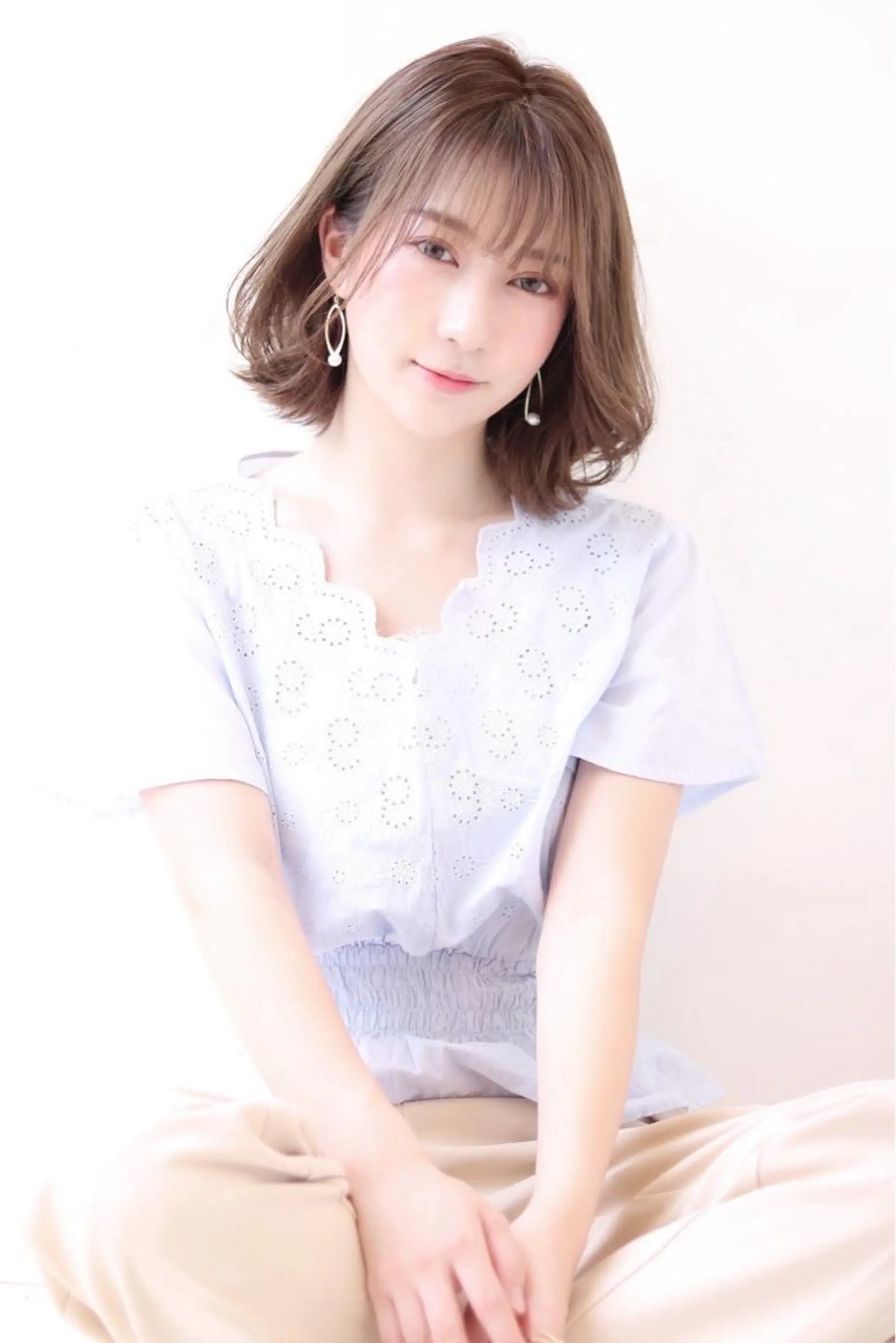 ミディアム 高見 紗代のヘアスタイル