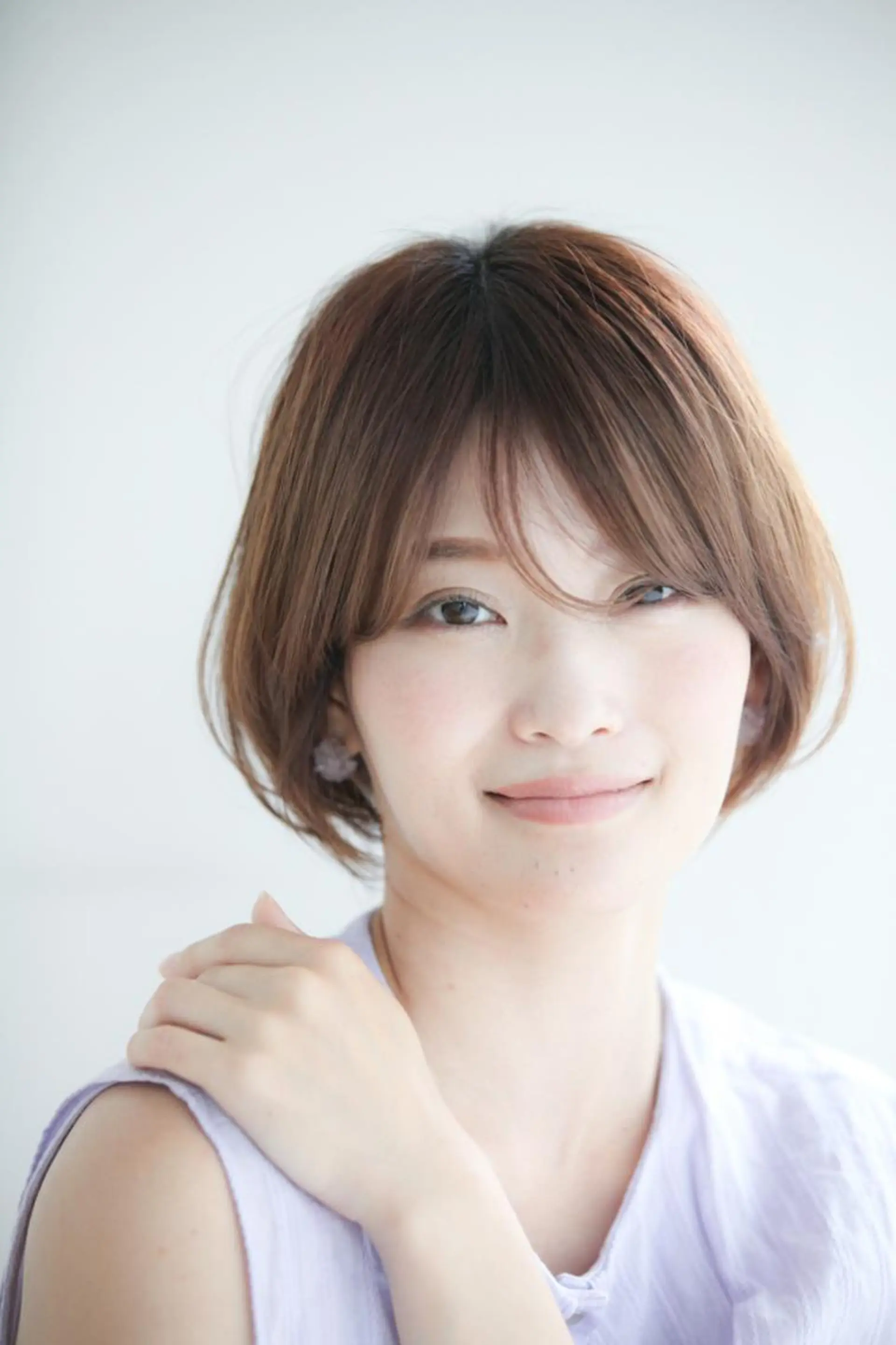 ミディアム HITOMI .のヘアスタイル
