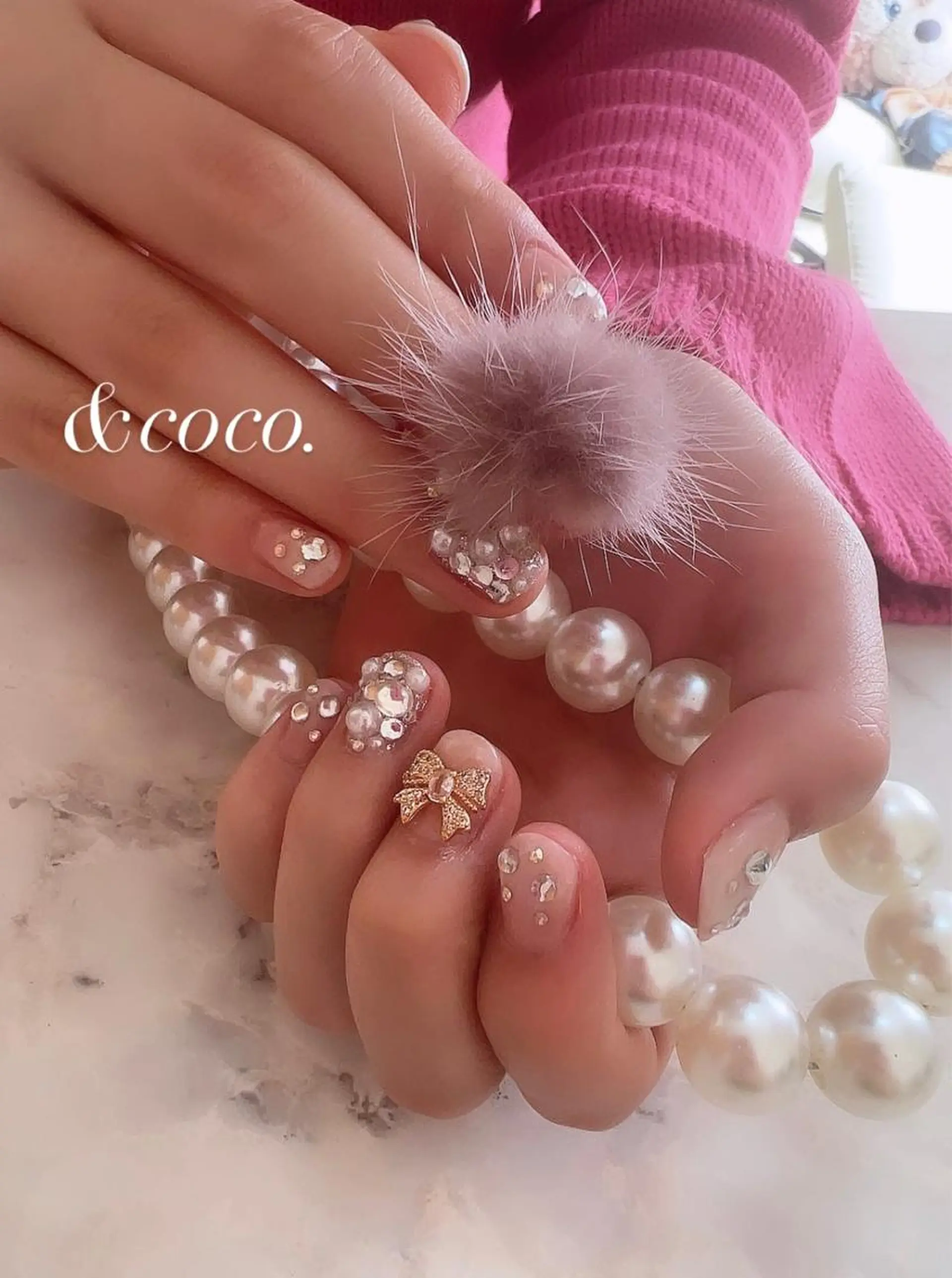 ネイル リボン ＆ coco.のネイルデザイン