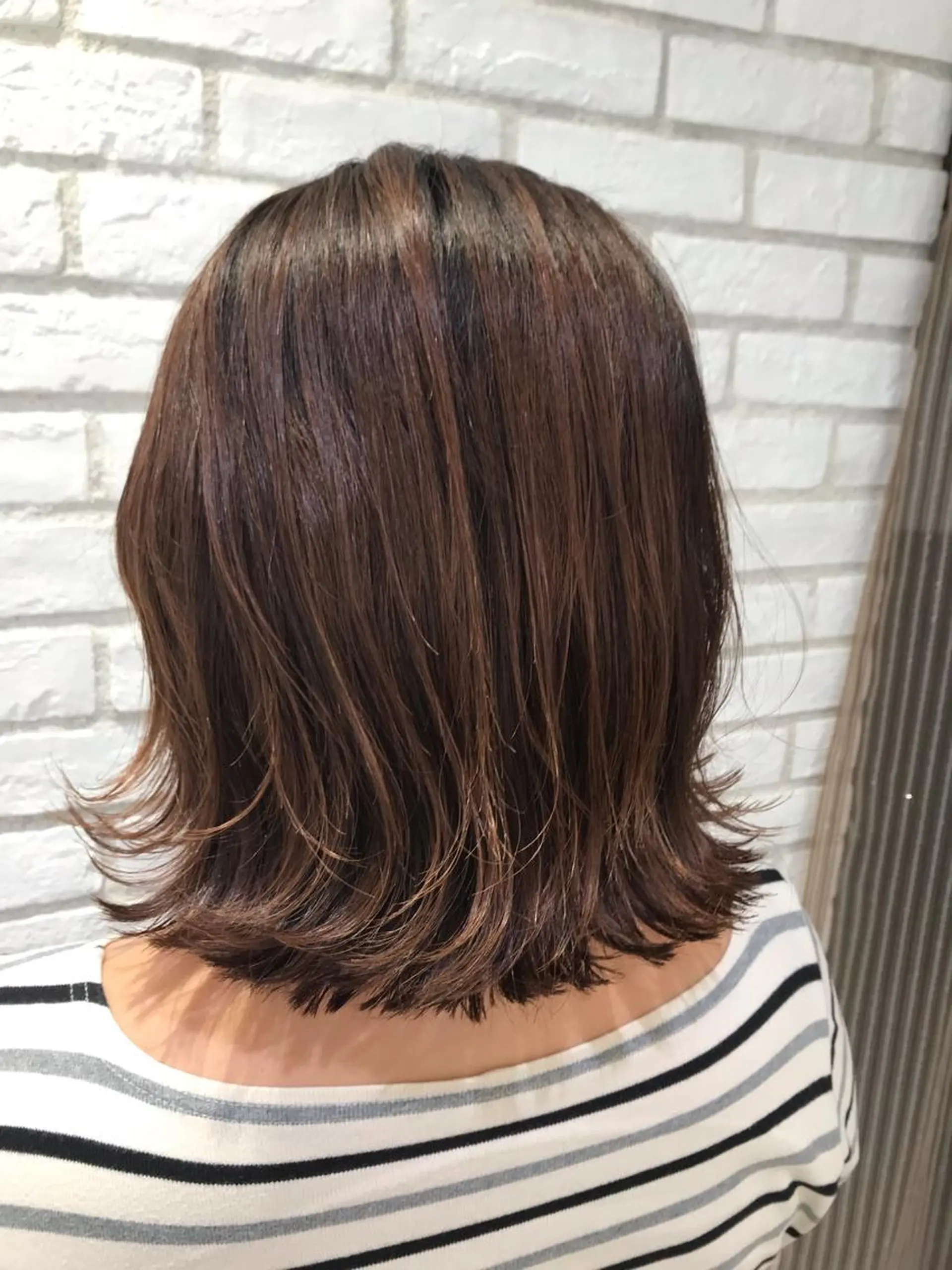 ミディアム ボブ 外ハネヘア 米良 志織のヘアスタイル