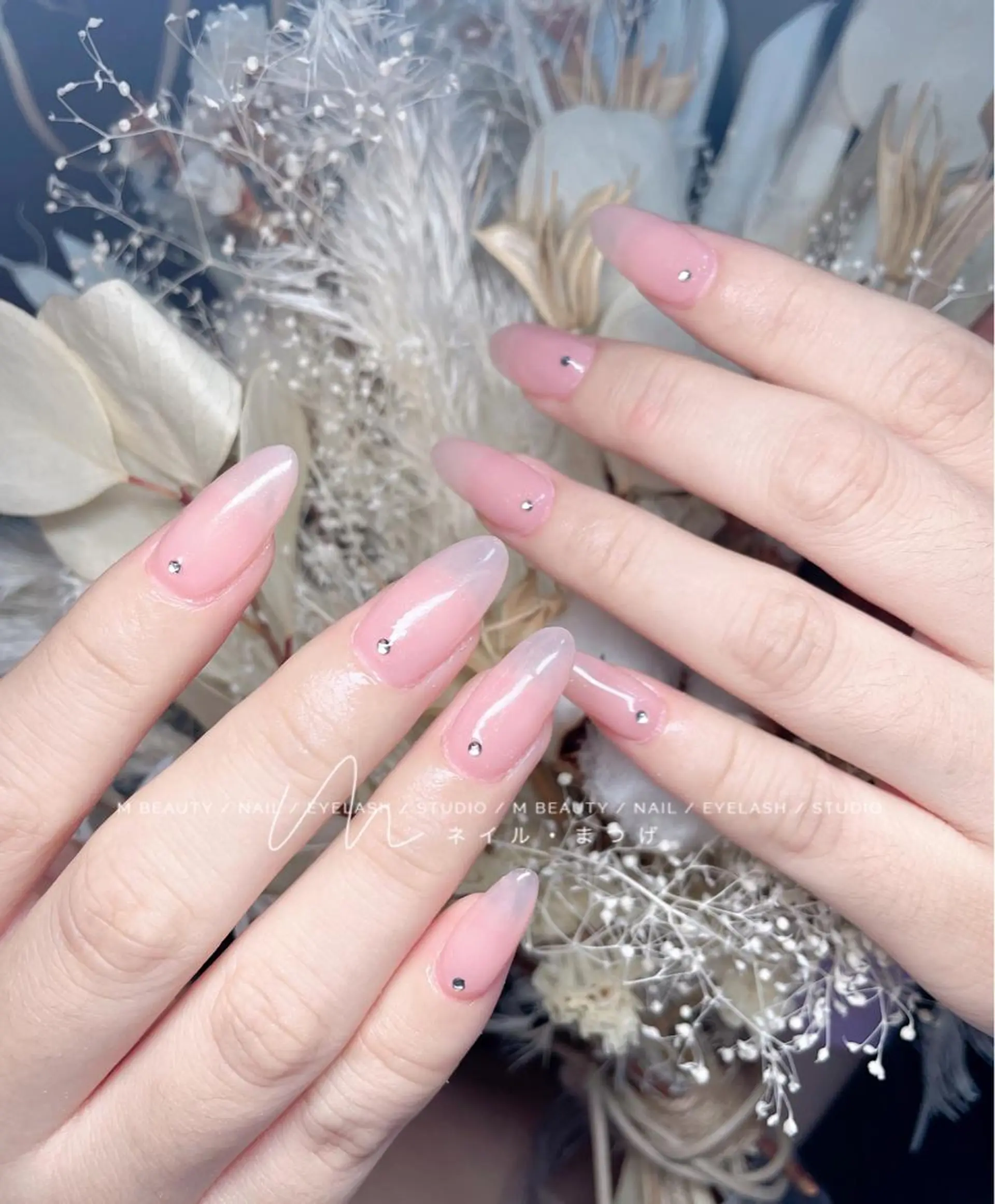 ネイル ストーンネイル M🌷nail 長さだし専門店のネイルデザイン