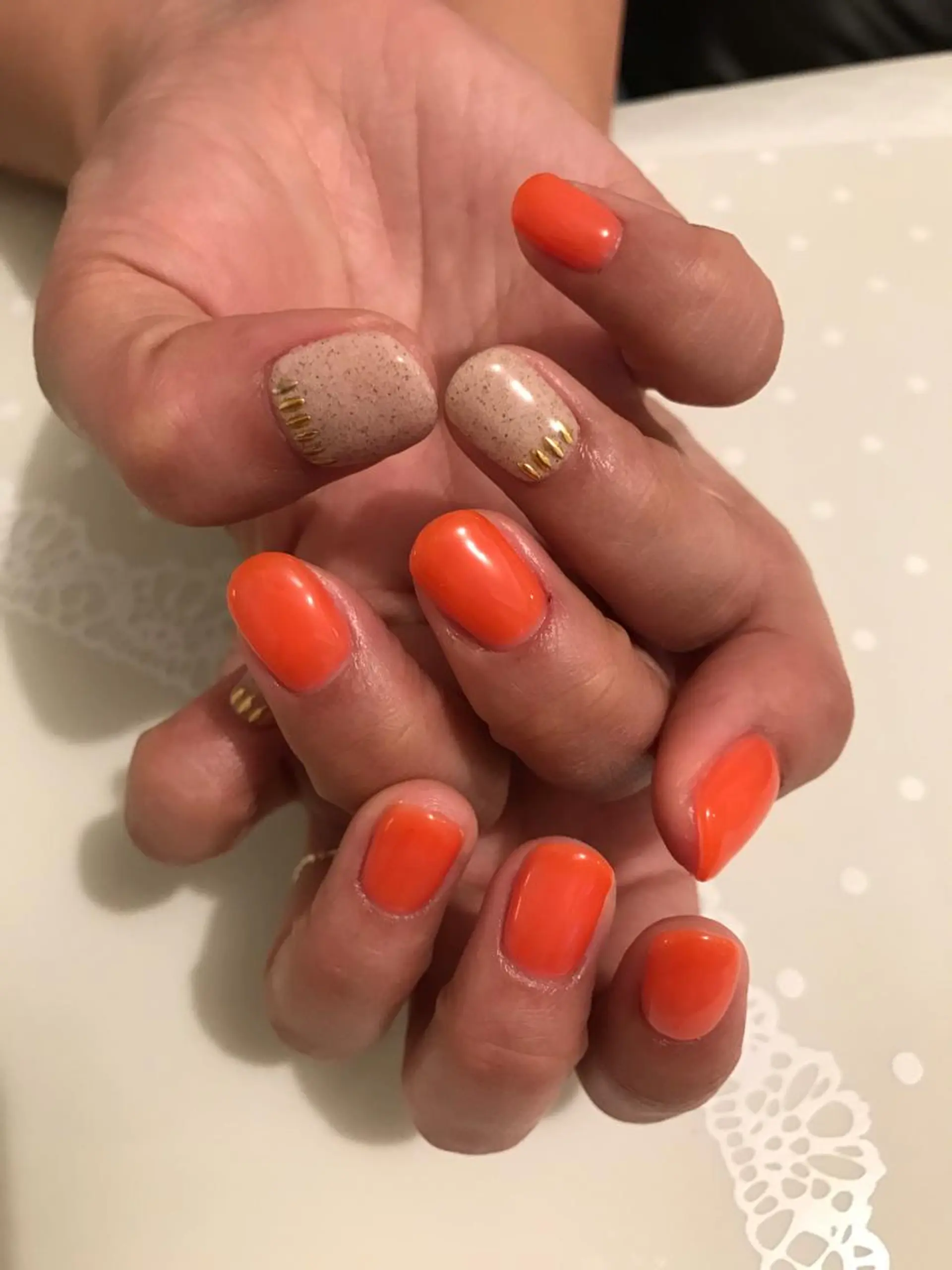 ネイル オレンジ atelier chic+所属・atelier chic+のネイルデザイン