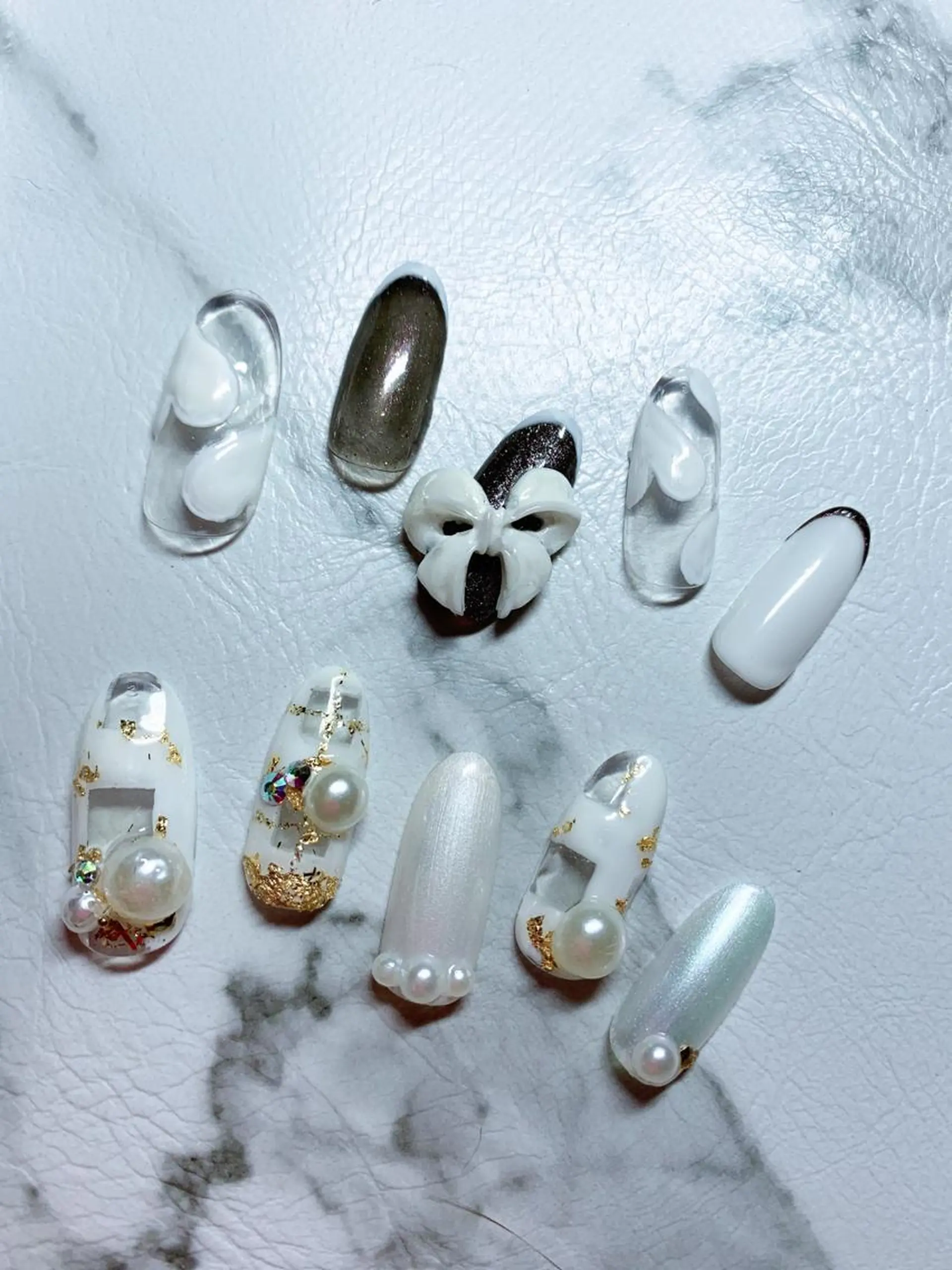 ネイル リボン ハンドネイル x.1.0.nail ♡Cのネイルデザイン