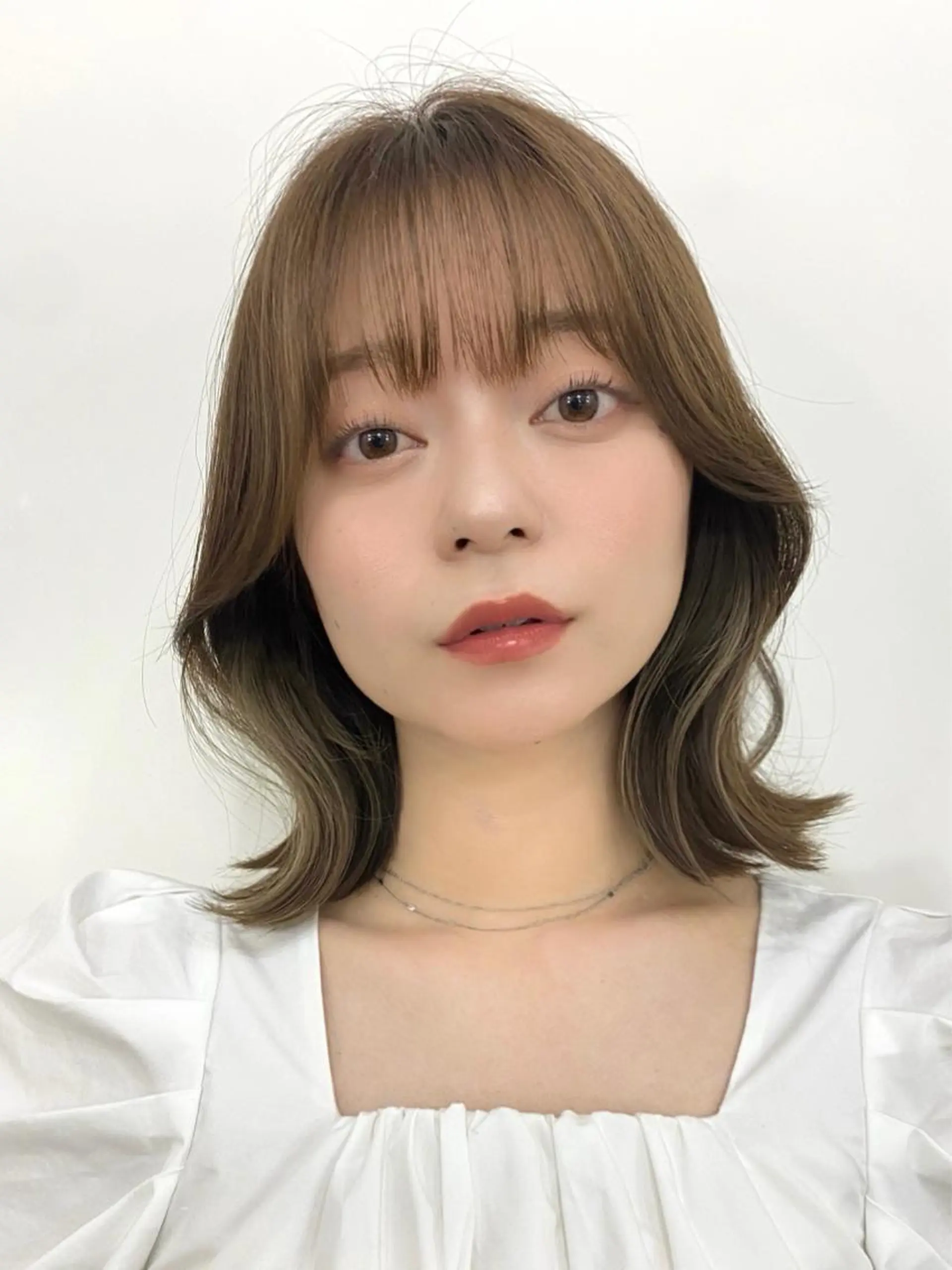ミディアム カラー パーマ ヘアアレンジ 切りっぱなしボブ ブリーチ 透明感カラー ブリーチなしカラー ボブ カット ヘアカラー トリートメント ヘアセット 小野寺瑞希 /最小顔カットのヘアスタイル