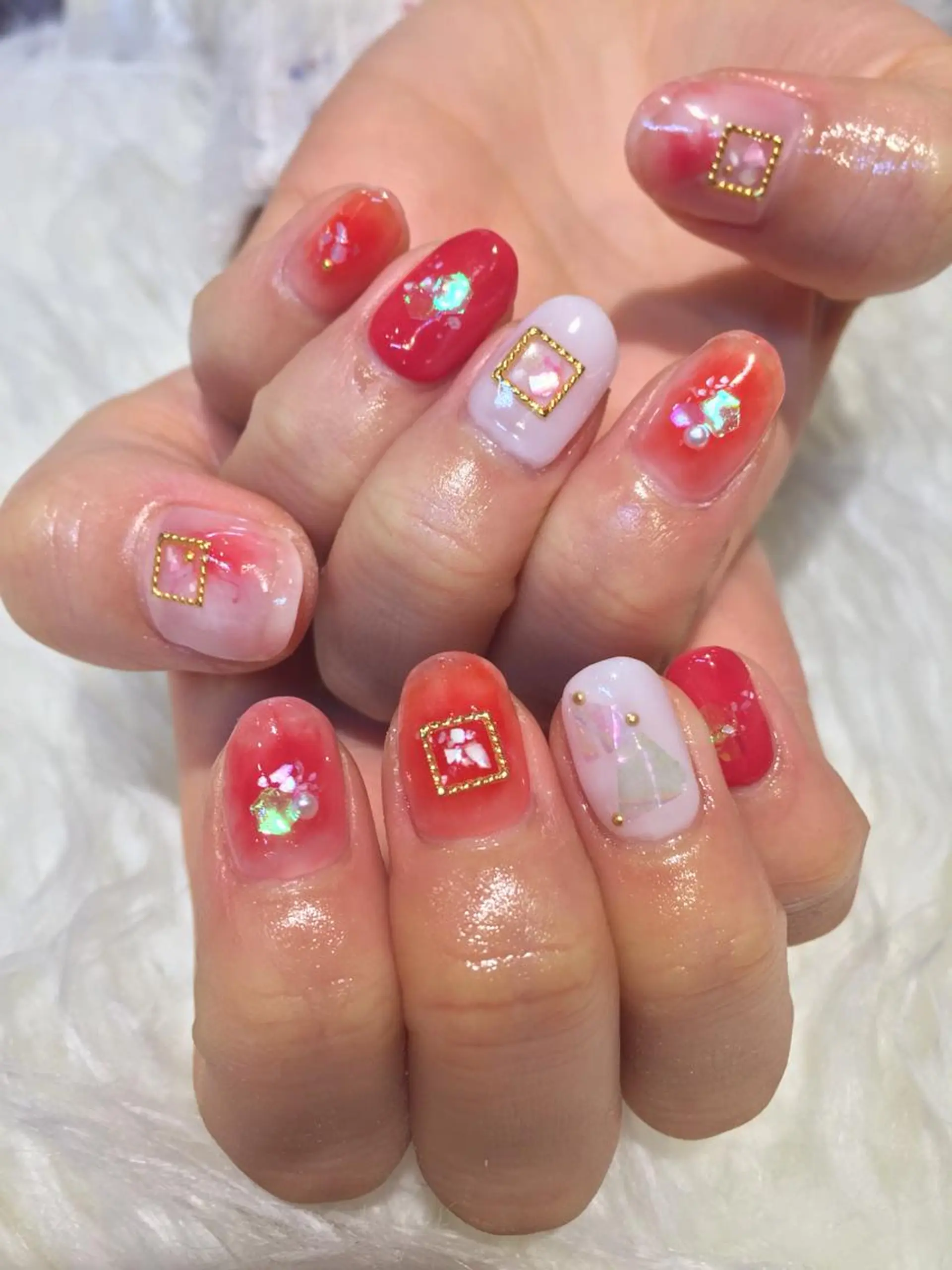 ネイル チークネイル 赤色 EARTH nanaのネイルデザイン