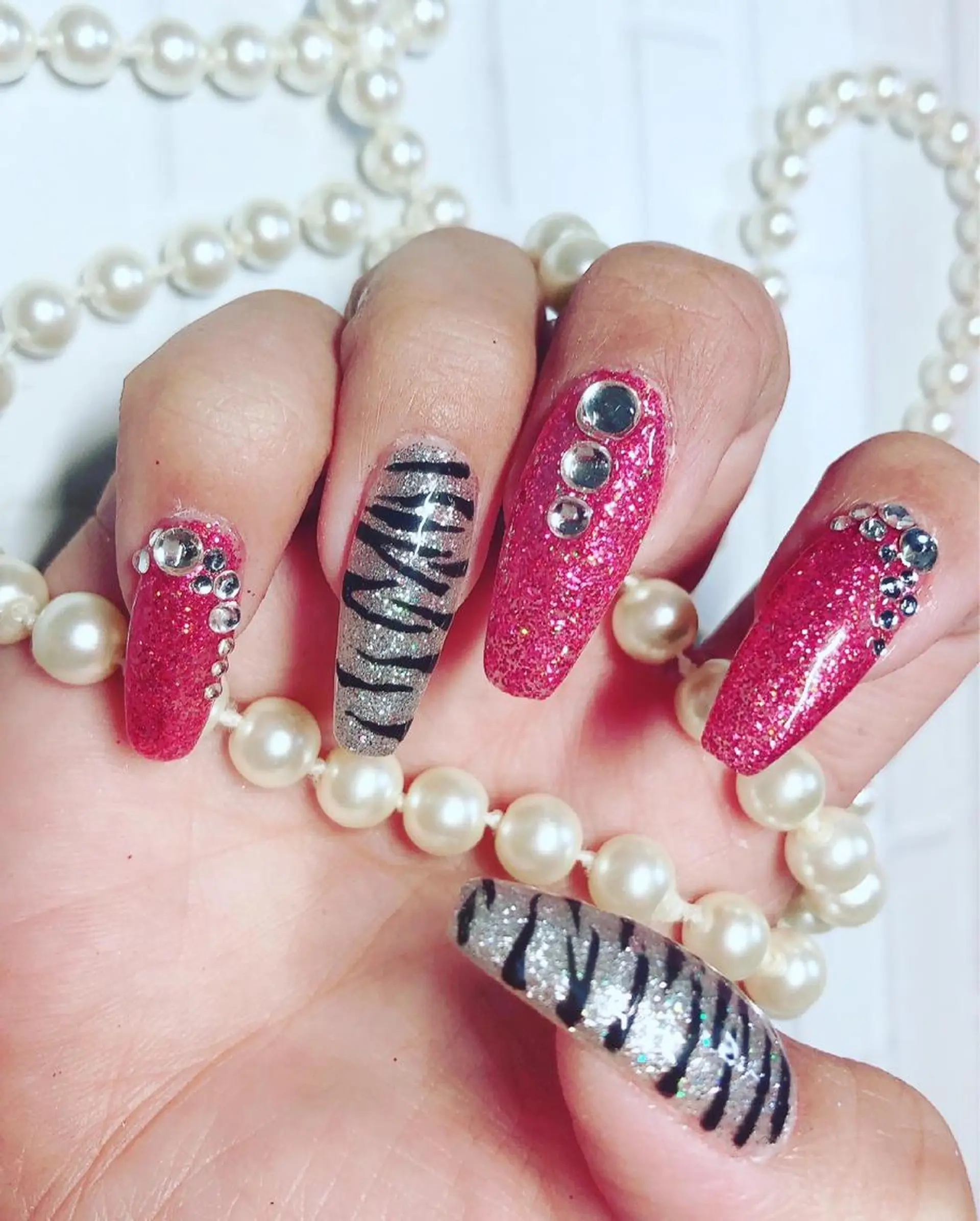 ネイル アニマル柄 キラキラネイル 春ネイル ハンドネイル ハンドケア ネイルサロン HARRYS所属・ネイル･脱毛サロン HARRYSのエステ・リラクイメージ