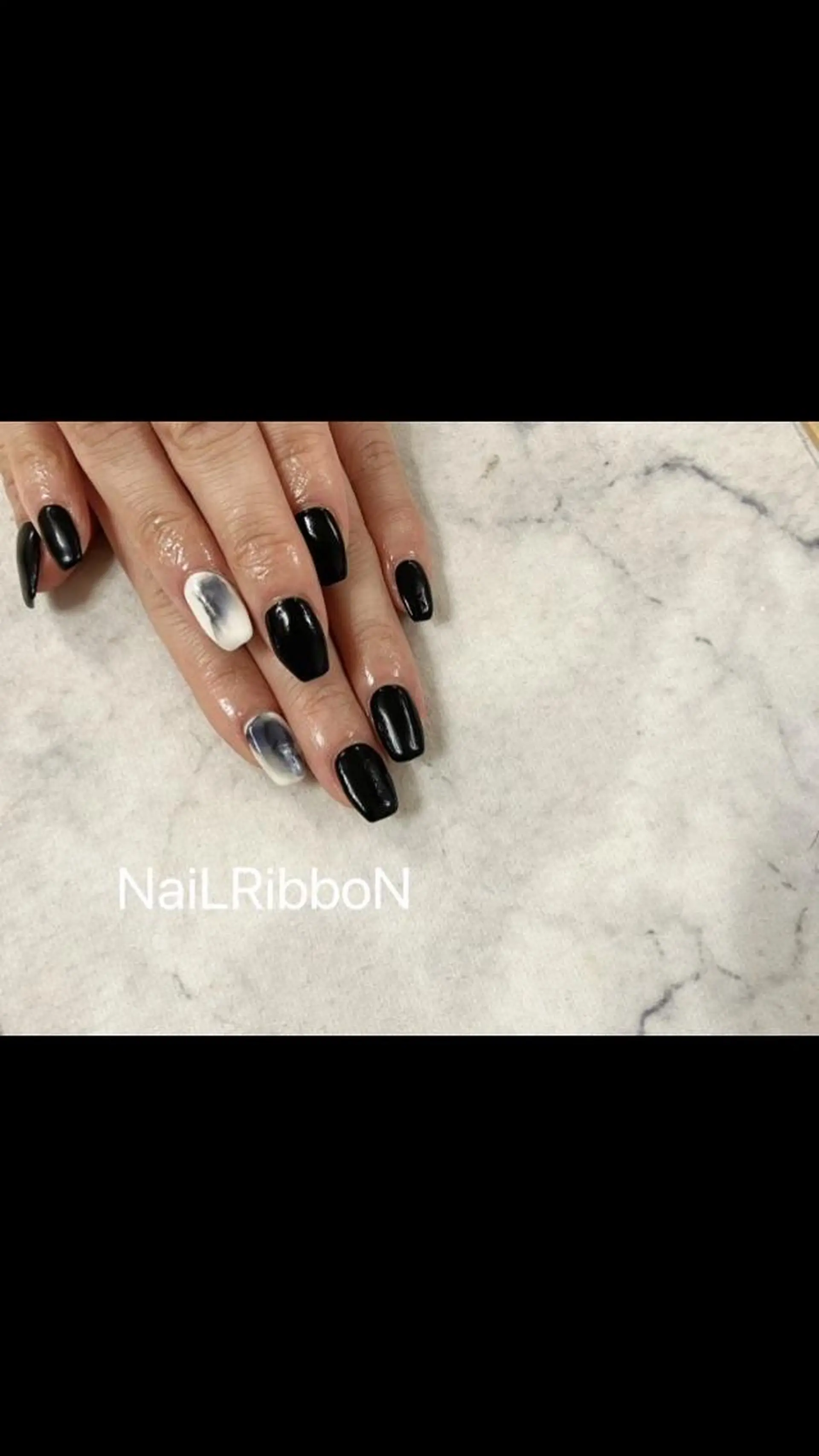 ネイル ネイルリボン 受付スタッフのネイルデザイン