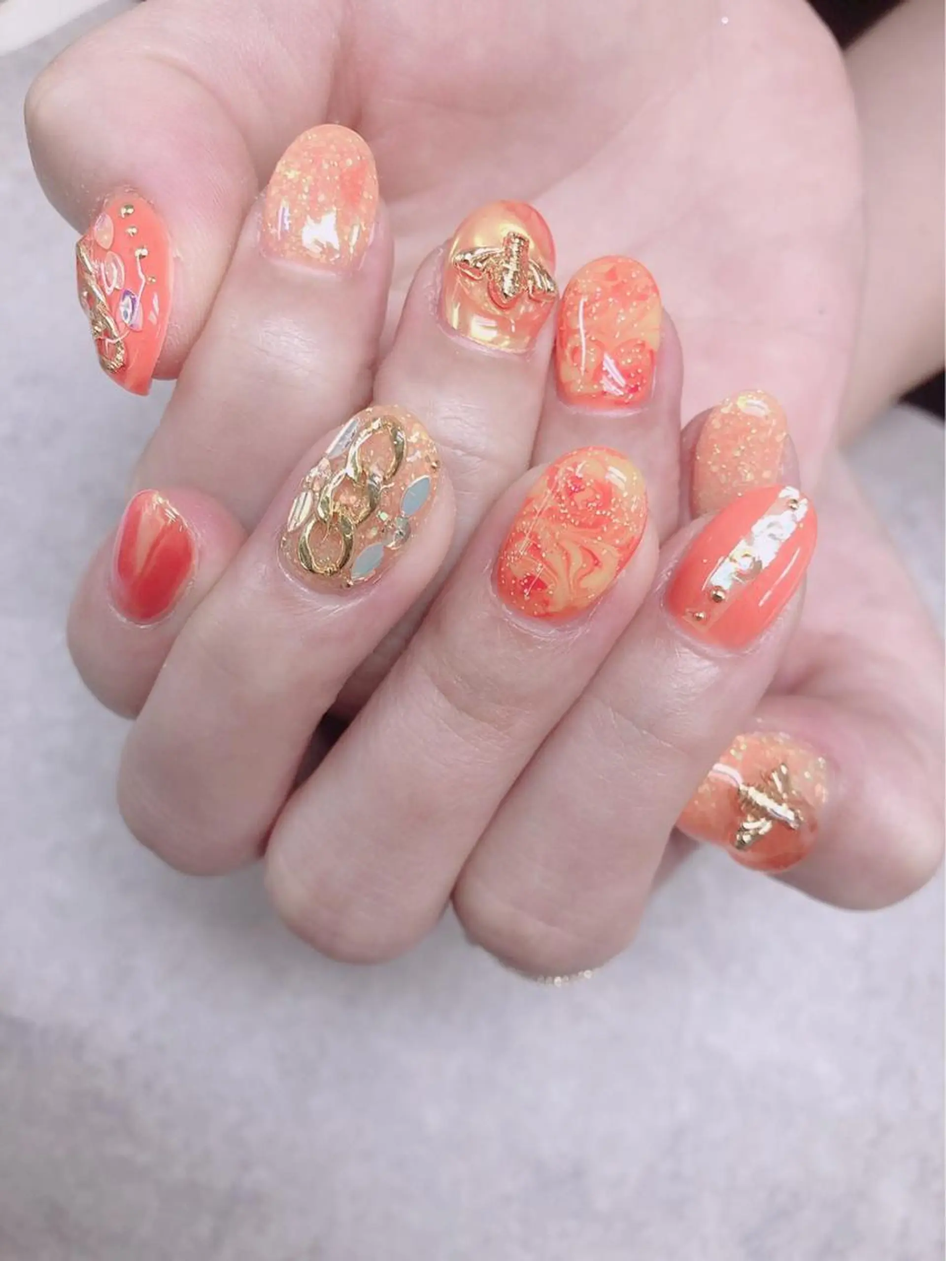 ネイル 大理石ネイル(マーブル) オレンジ ハンドネイル ハンドケア FASTNAIL PLUS 新宿店のネイルデザイン