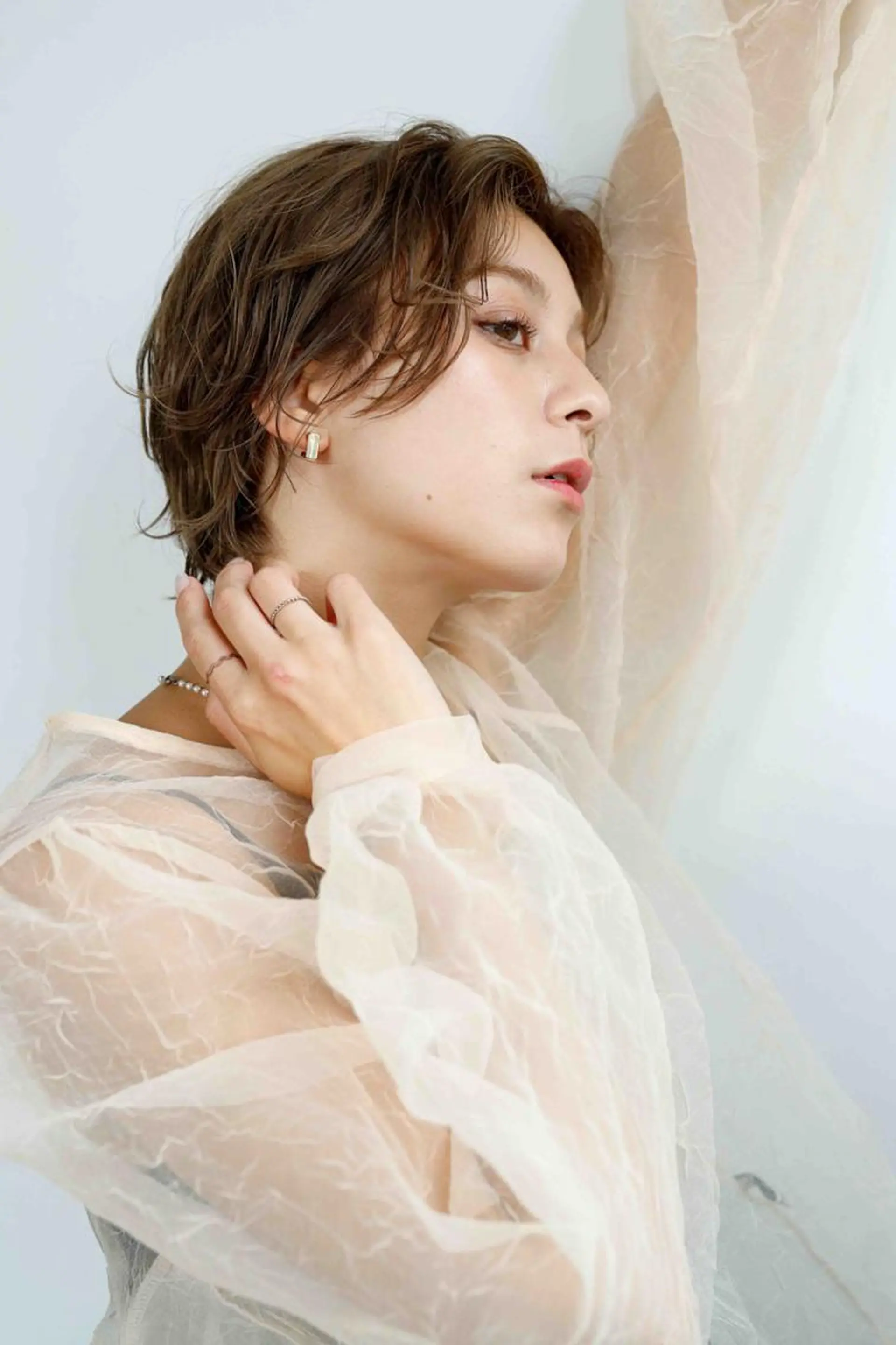 パーマ ショート カラー アディクシーカラー ベージュカラー ケアカラー 透明感カラー イヤリングカラー ヘアカラー トリートメント ヘアケア特化型サロン newi 京橋のヘアスタイル