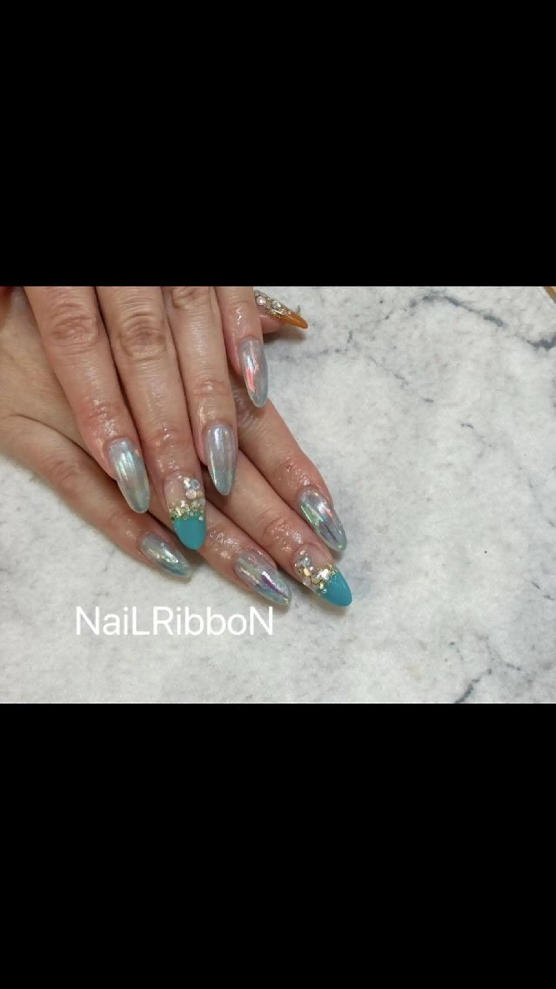 ネイル ネイルリボン 受付スタッフのネイルデザイン