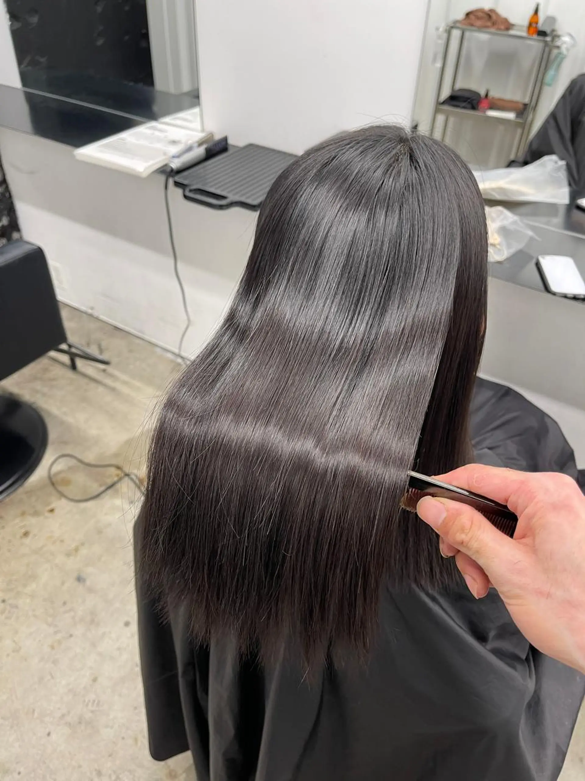 セミロング パーマ TAKUMI .のヘアスタイル