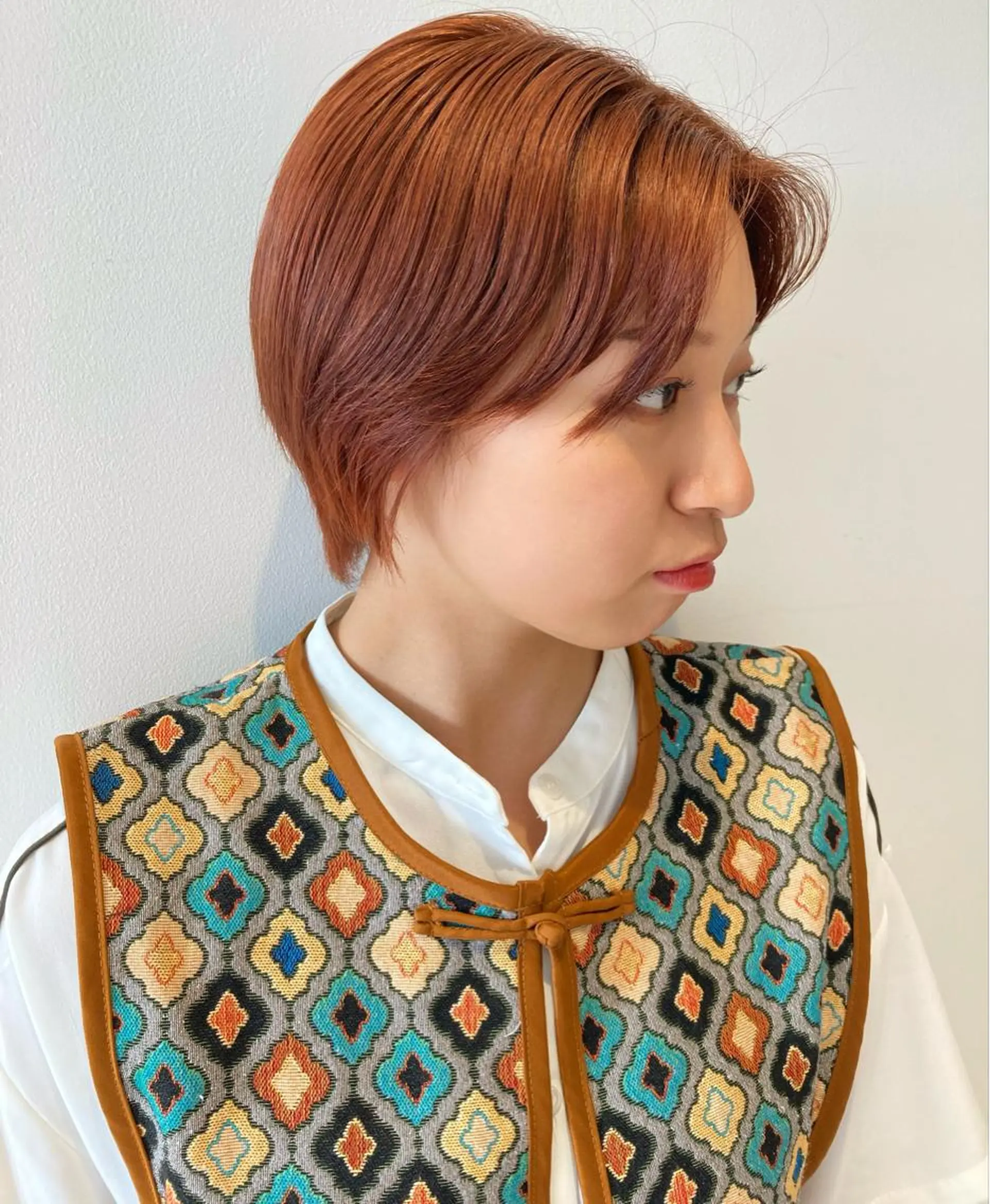 ショート カラー オレンジ nono/パーマ /顔まわりカット🐈のヘアスタイル