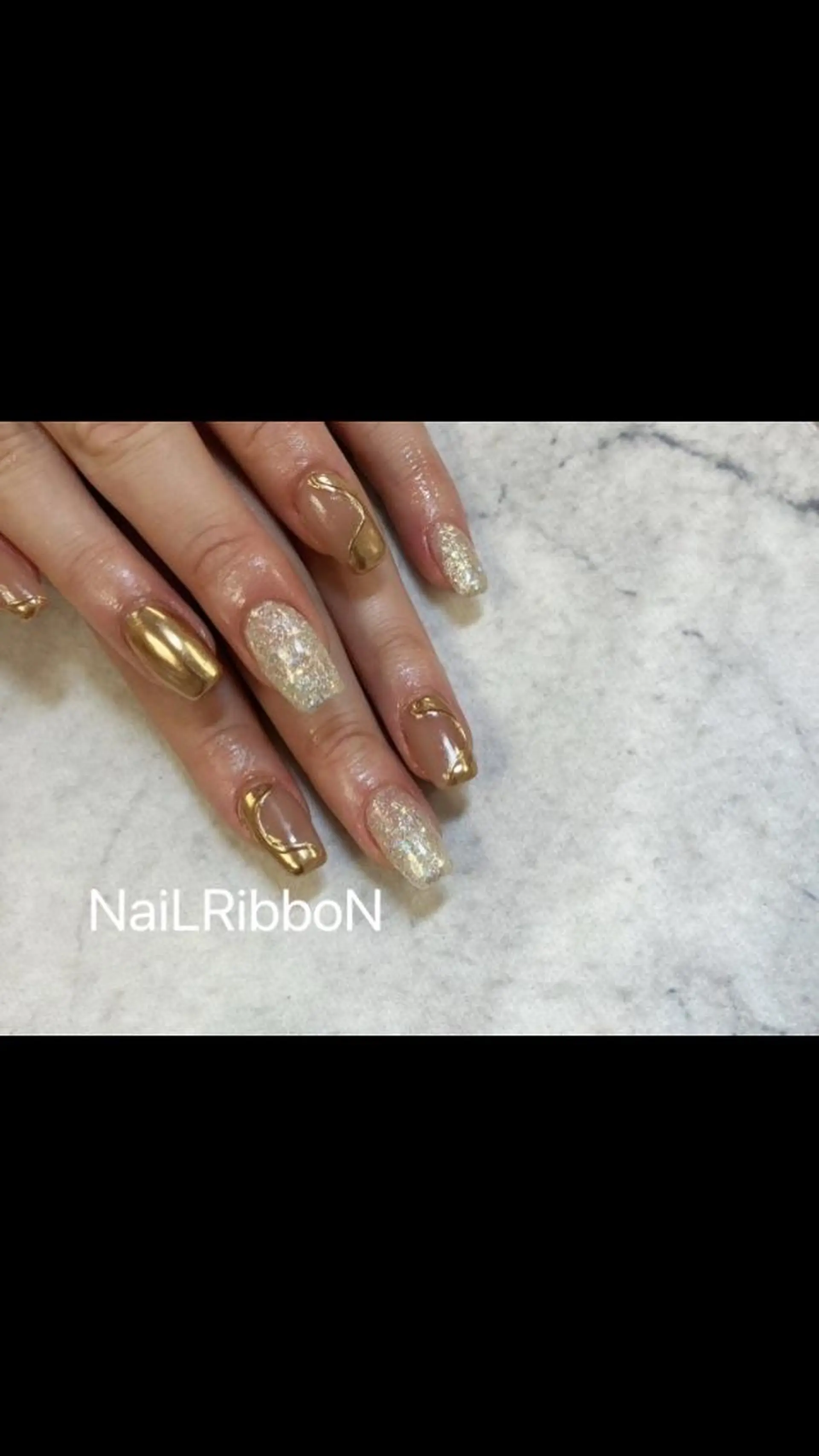 ネイル ネイルリボン 受付スタッフのネイルデザイン