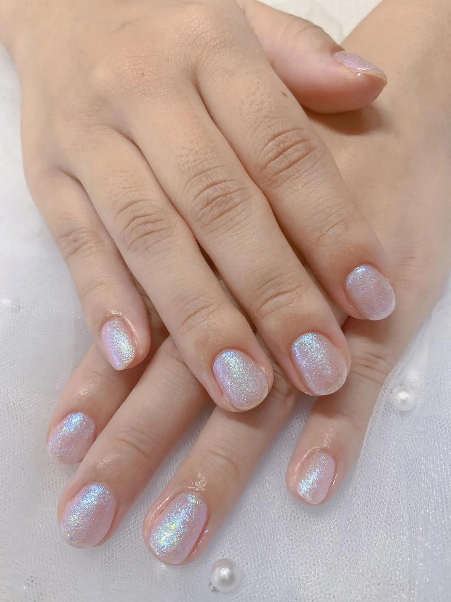 ネイル オーロラネイル ワンカラーネイル ホワイト Jasmine nailsalon所属・ジャスミン ネイルサロンのネイルデザイン