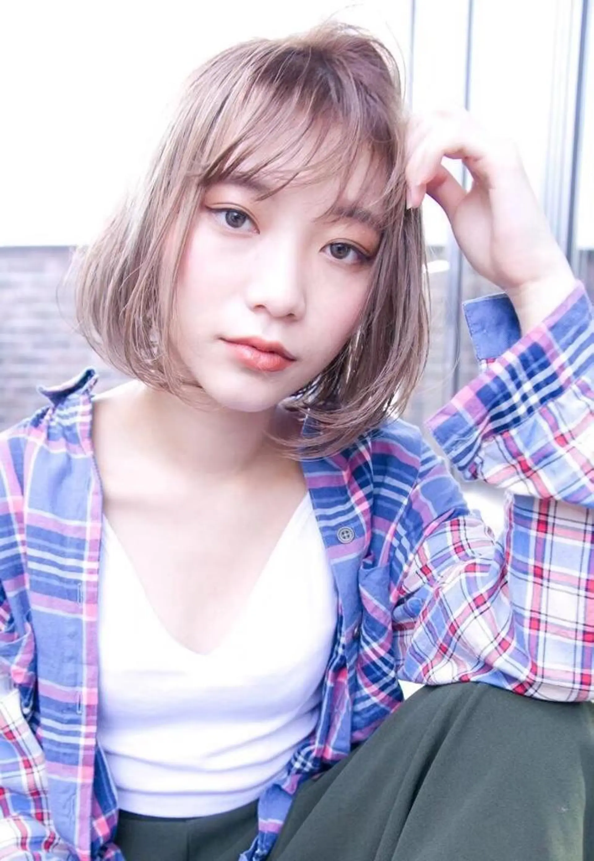 ミディアム ボブ MUSASHI ブリーチカラー◎のヘアスタイル
