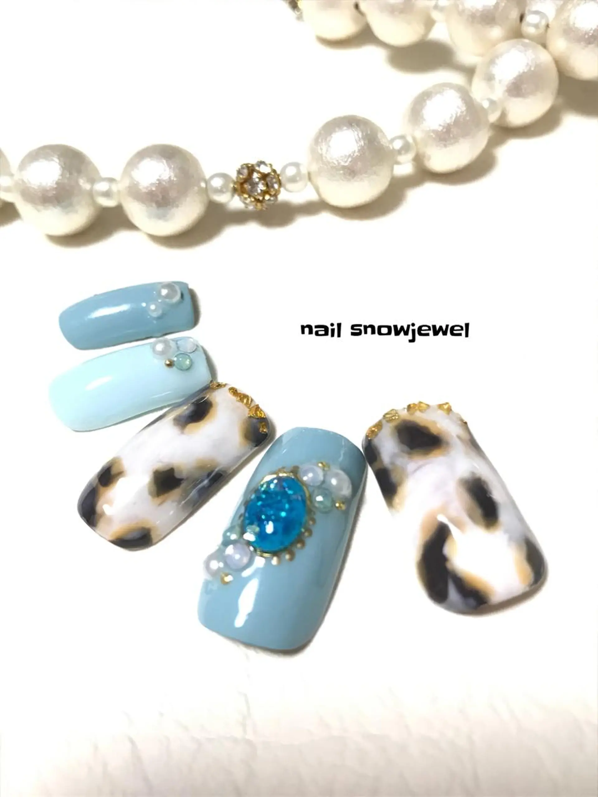 ネイル べっ甲ネイル ホワイト nail snowjewelのネイルデザイン