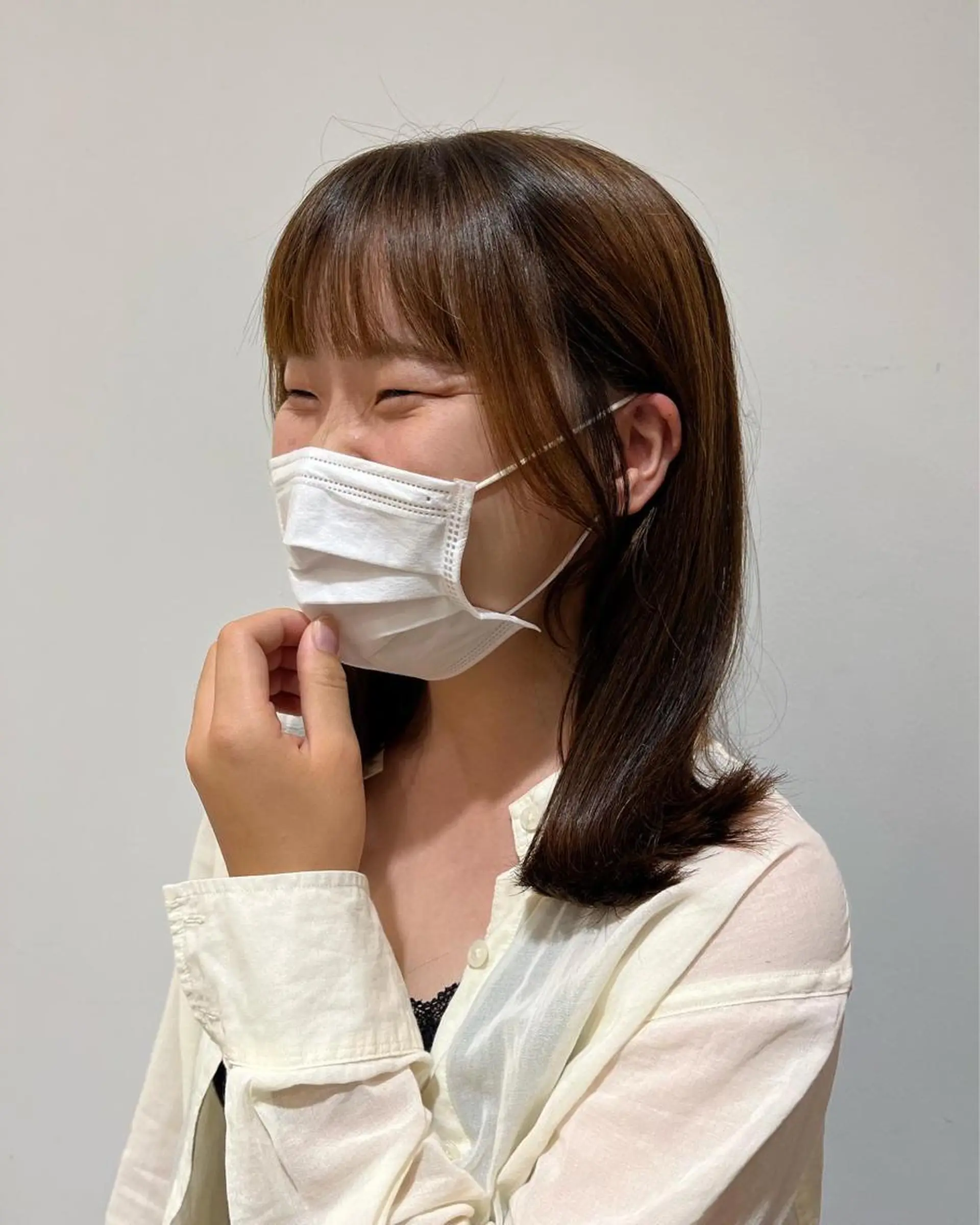 ミディアム 顔周りカット 西崎 満里奈のヘアスタイル