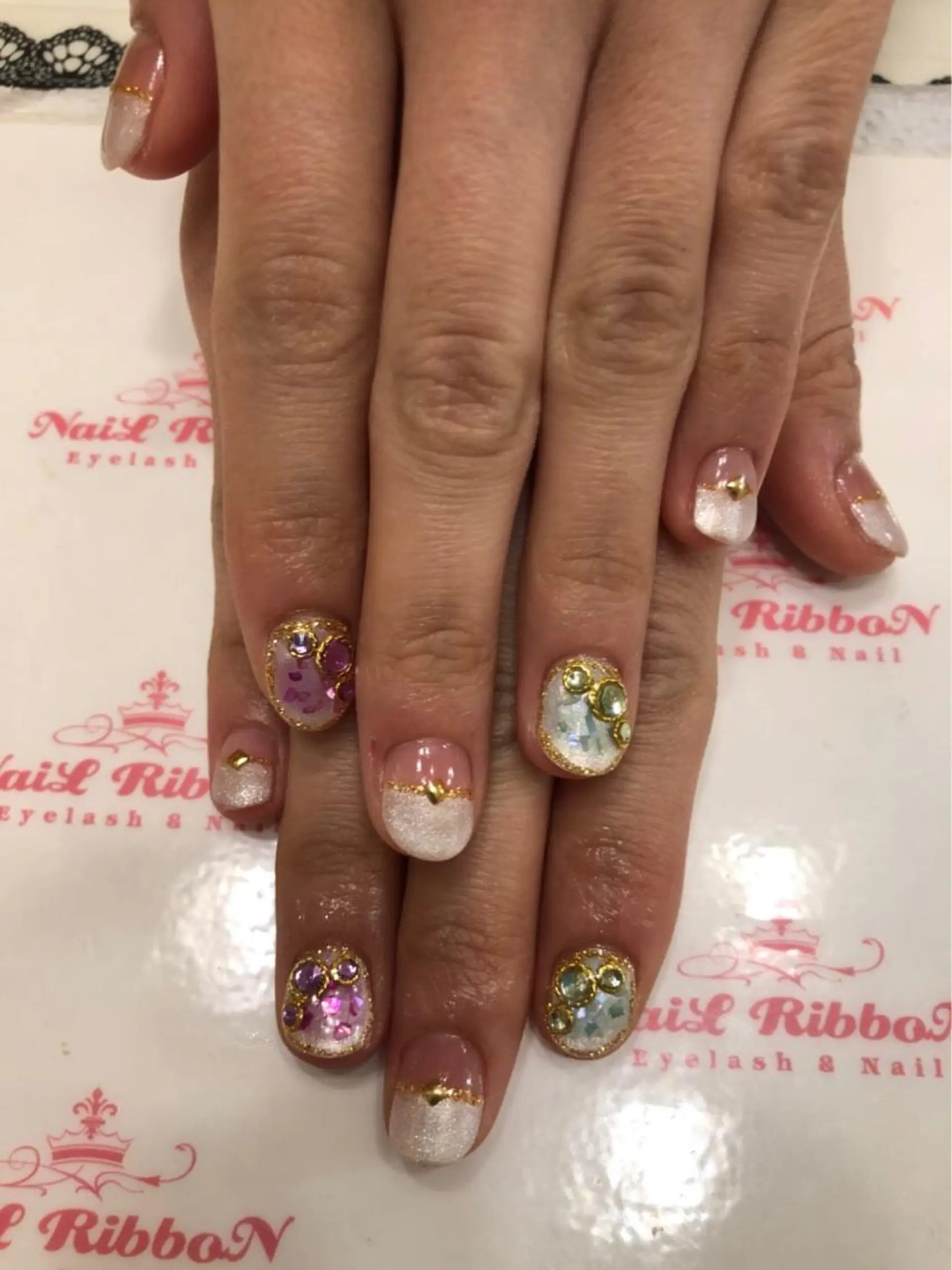 ネイル ネイルリボン 受付スタッフのネイルデザイン