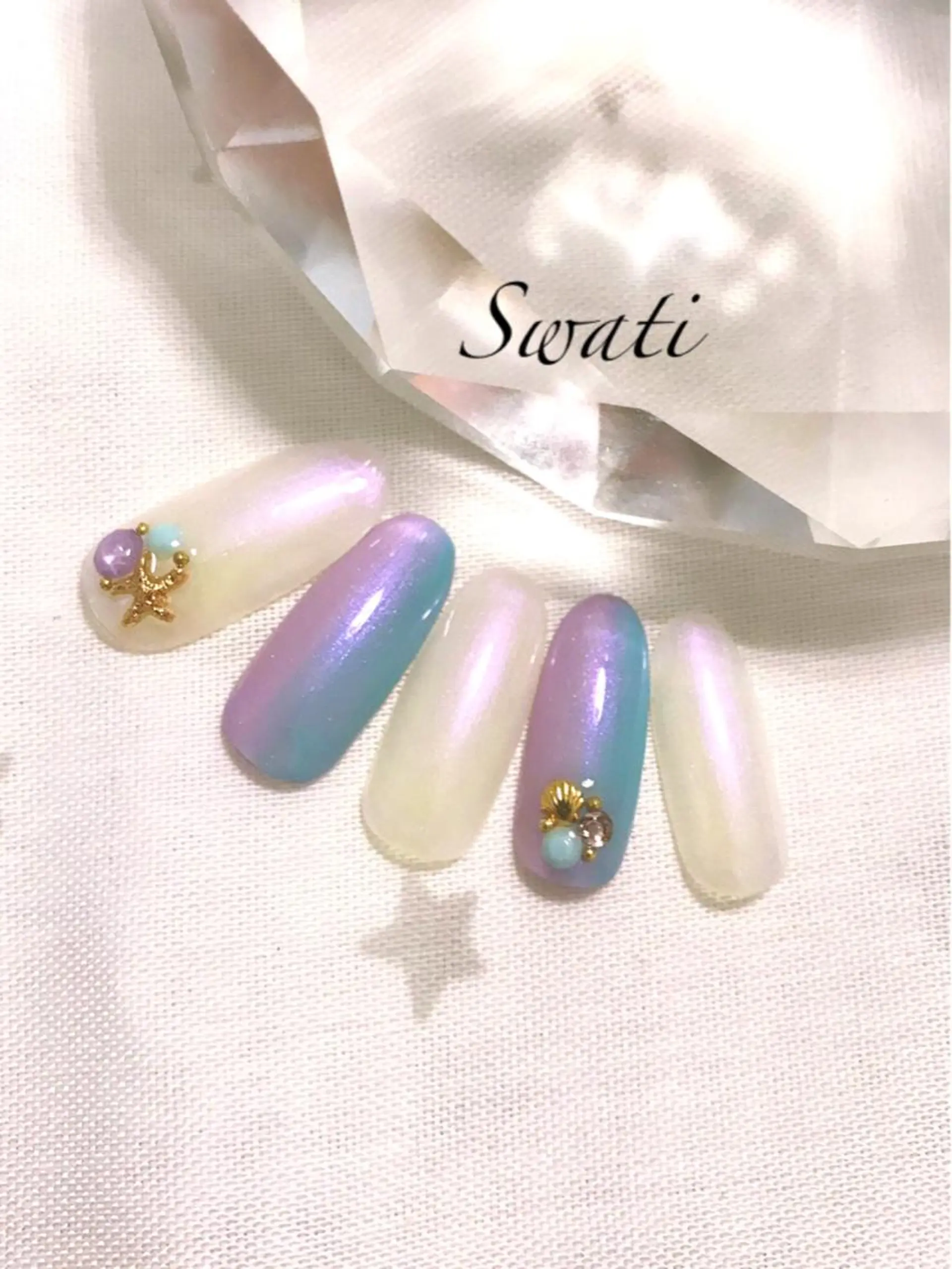 ネイル アートネイル グラデーション 水色 オフィスネイル パープル yuko （ネイリスト）のネイルデザイン