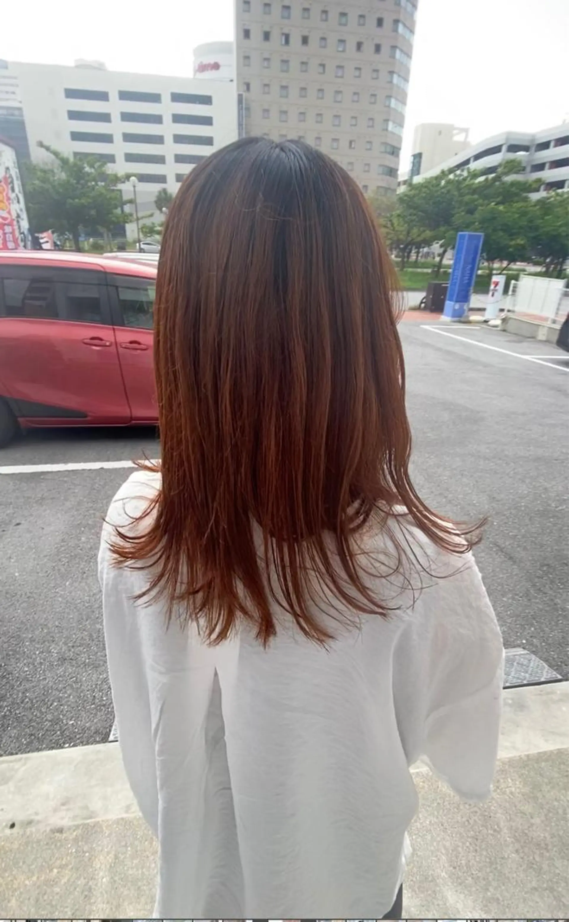 ロング カラー ハイトーンカラー オレンジ ヘアカラー トリートメント AngeBay.NaHa所属・饒平名 知也のヘアスタイル