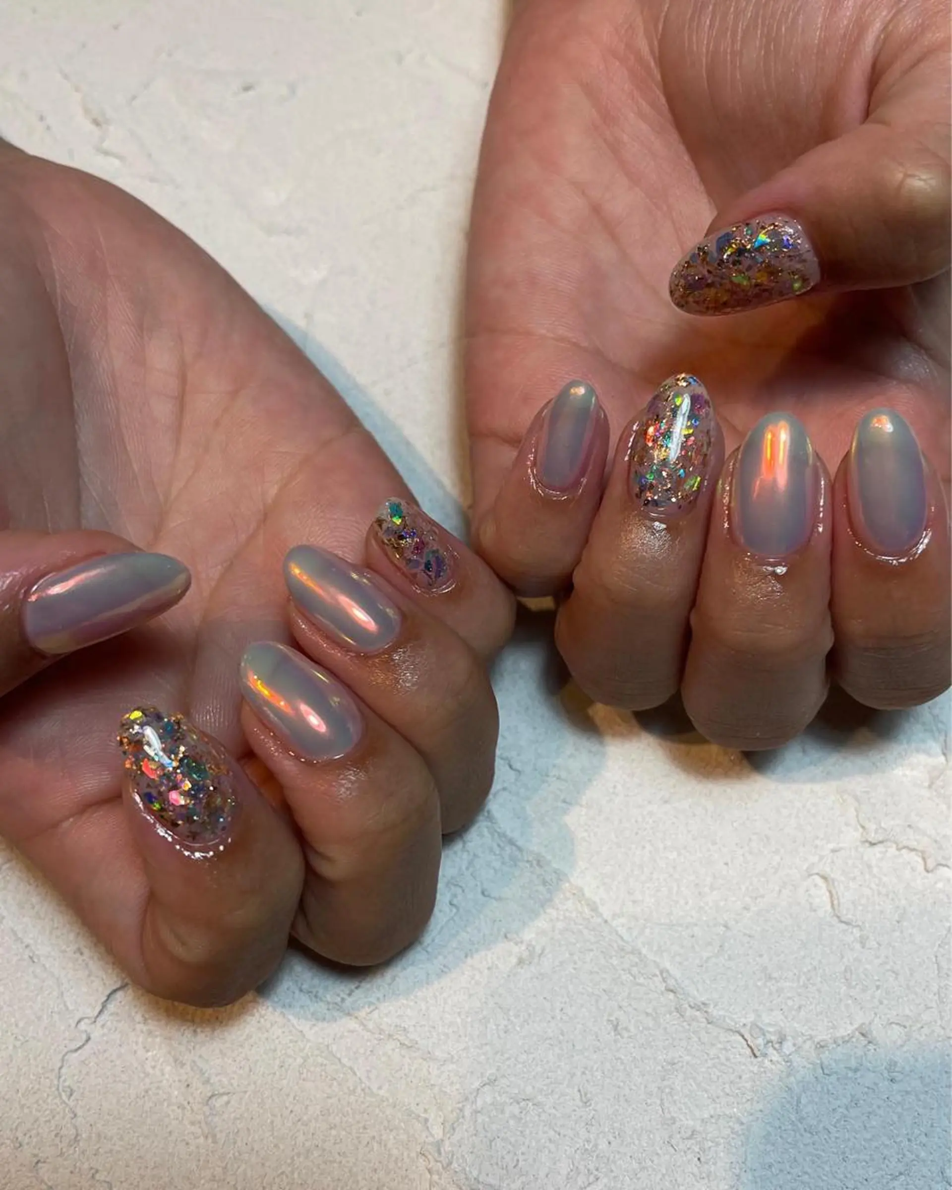 ネイル オーロラネイル 氷ネイル・うるうるネイル キラキラネイル ミラーネイル 夏ネイル Nail salon Euphoria所属・Nail salon Euphoriaのネイルデザイン