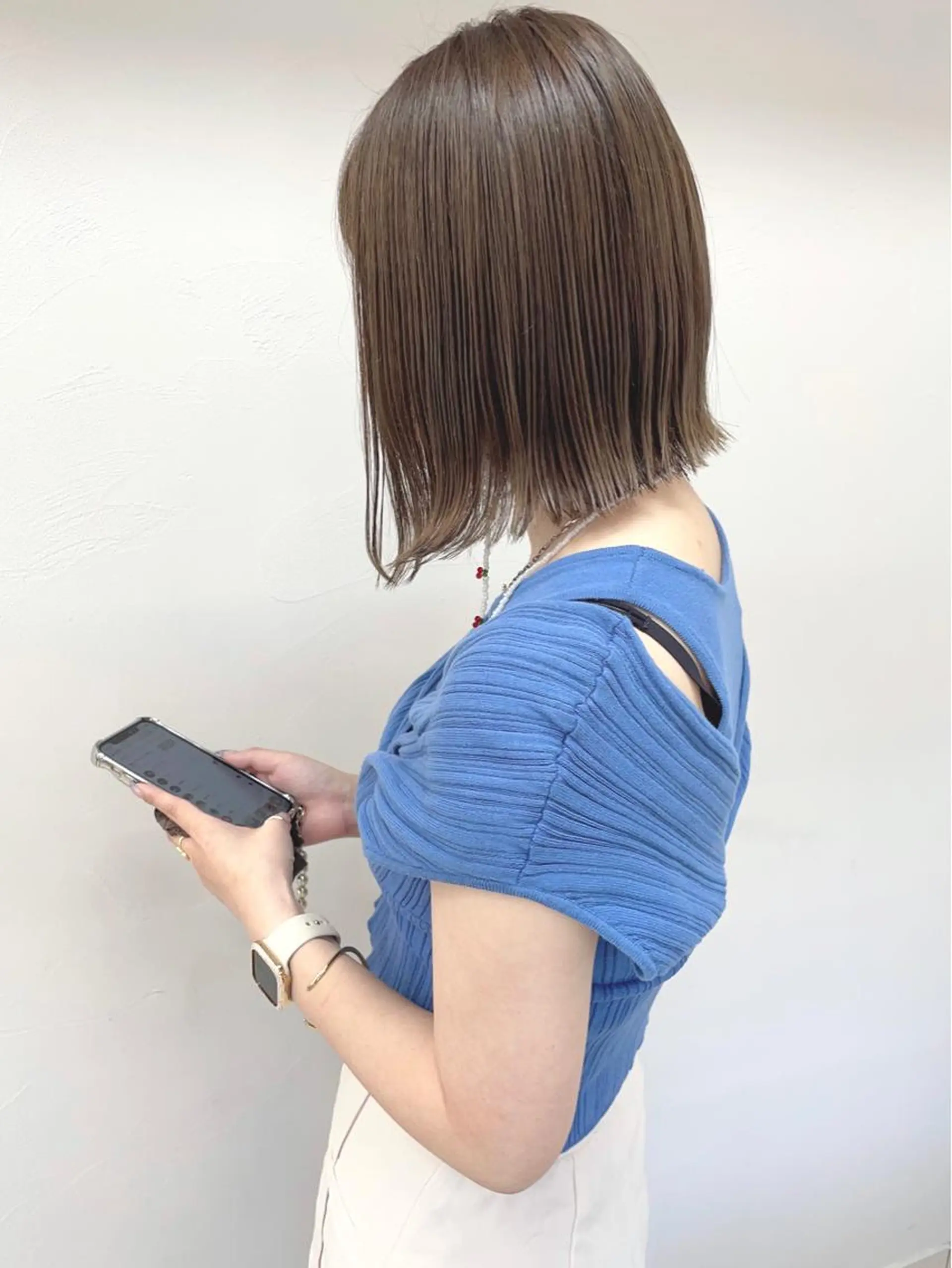 ミディアム センターパート /ニュアンスパーマのヘアスタイル