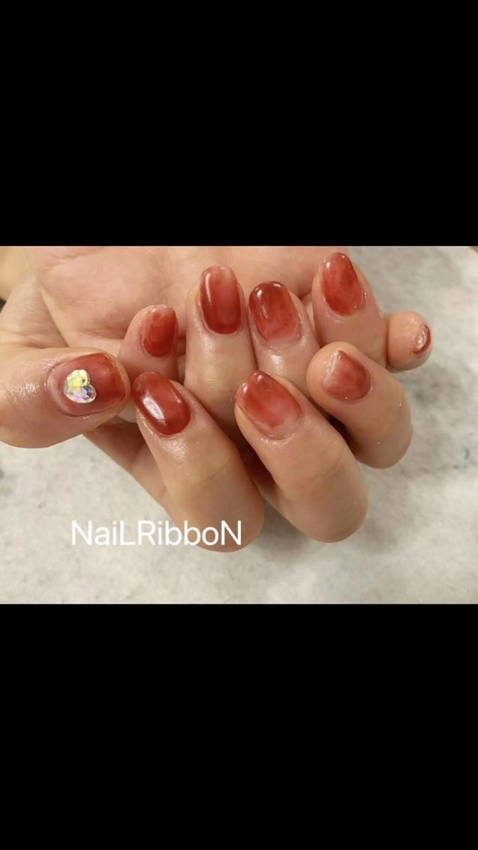 ネイル ネイルリボン 受付スタッフのネイルデザイン