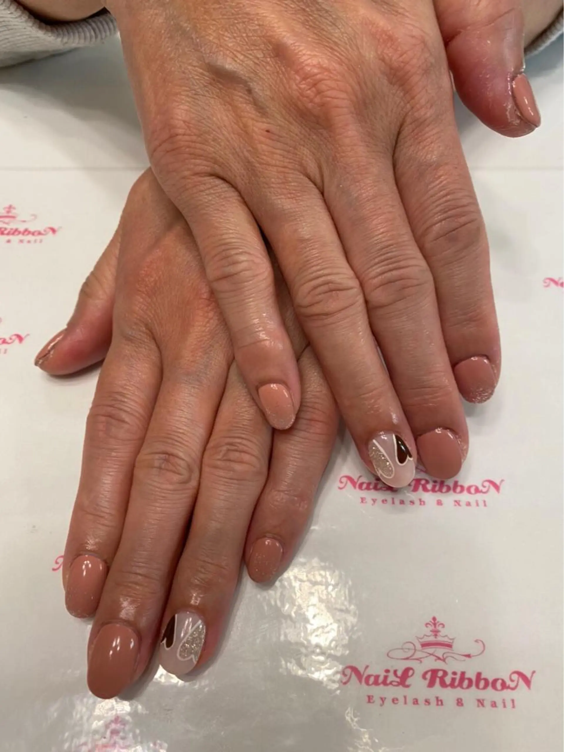 ネイル 春ネイル ネイルリボン 受付スタッフのネイルデザイン