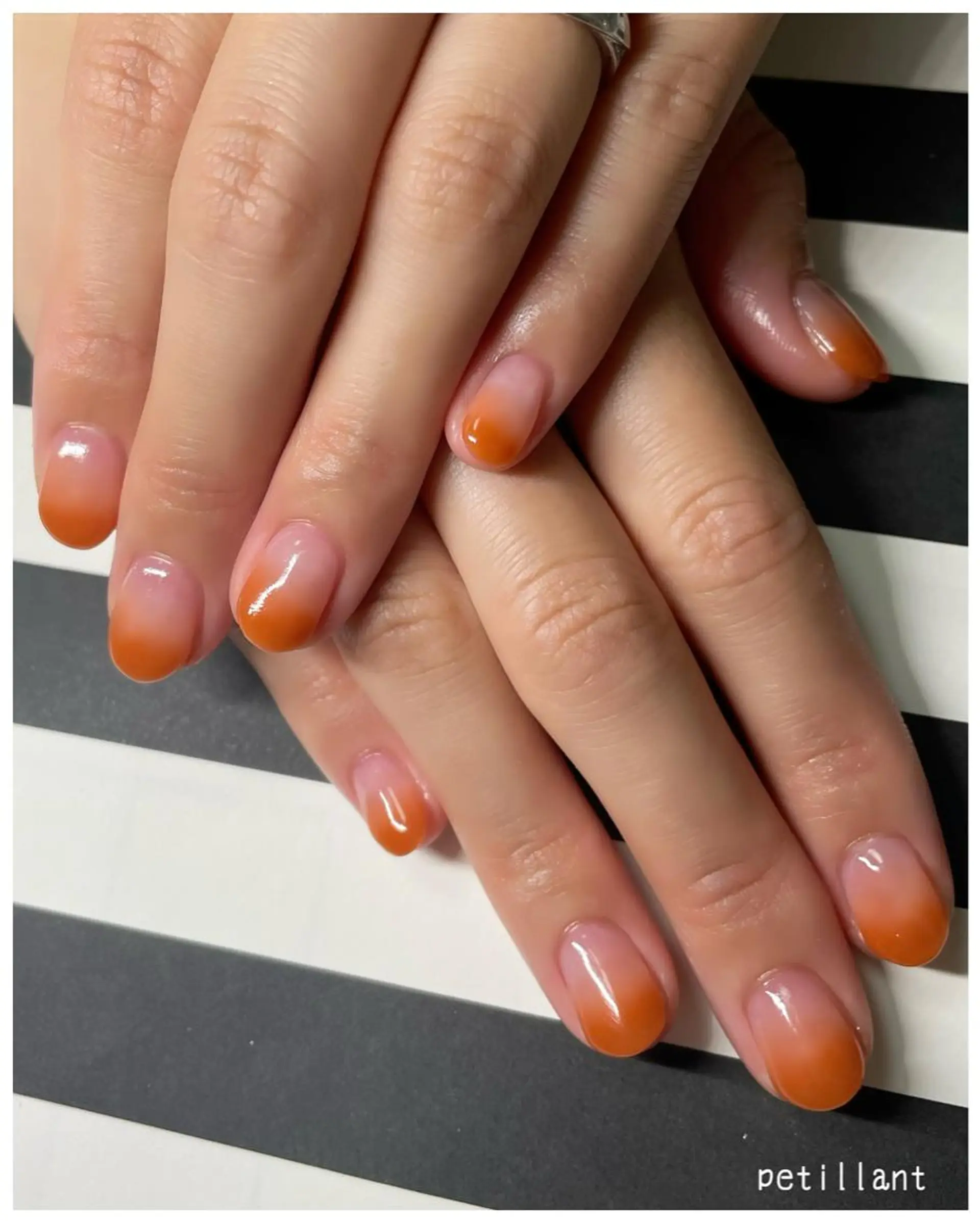 ネイル グラデーション オレンジ ピンク petillant所属・nail salon petillantのネイルデザイン