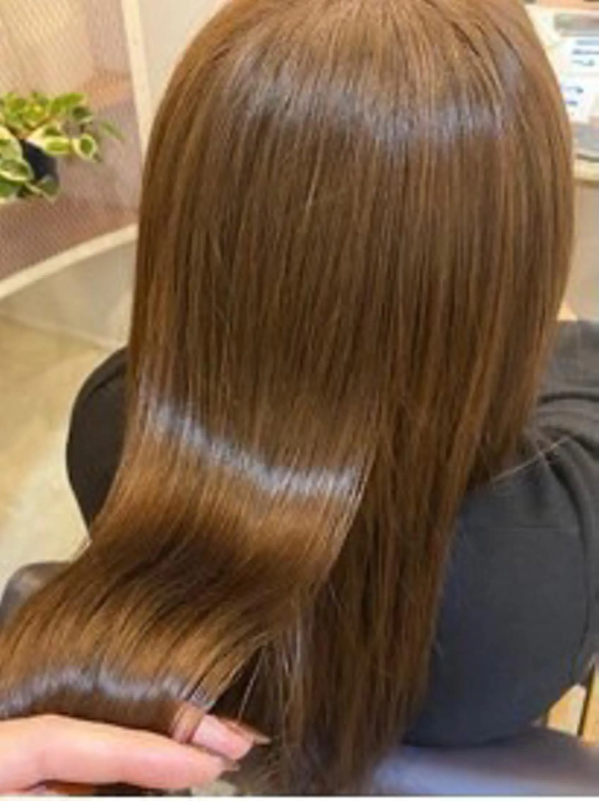 ロング 金気 真央のヘアスタイル