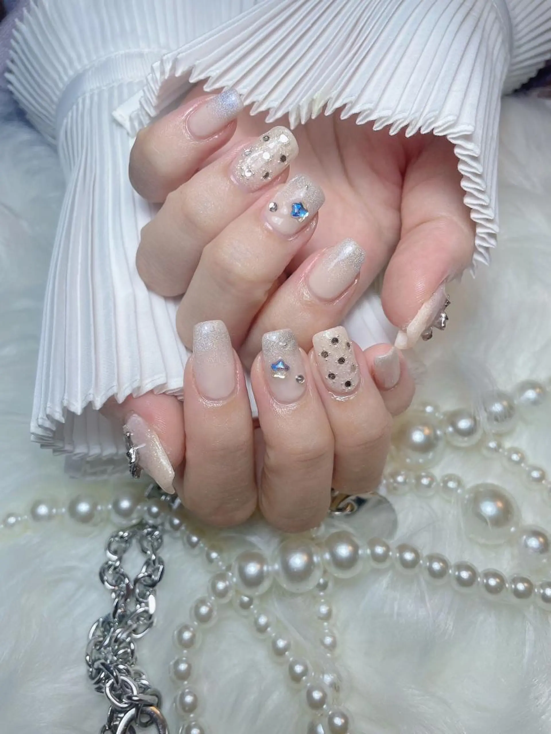 ネイル RAFFINE 月🦋🩵のネイルデザイン