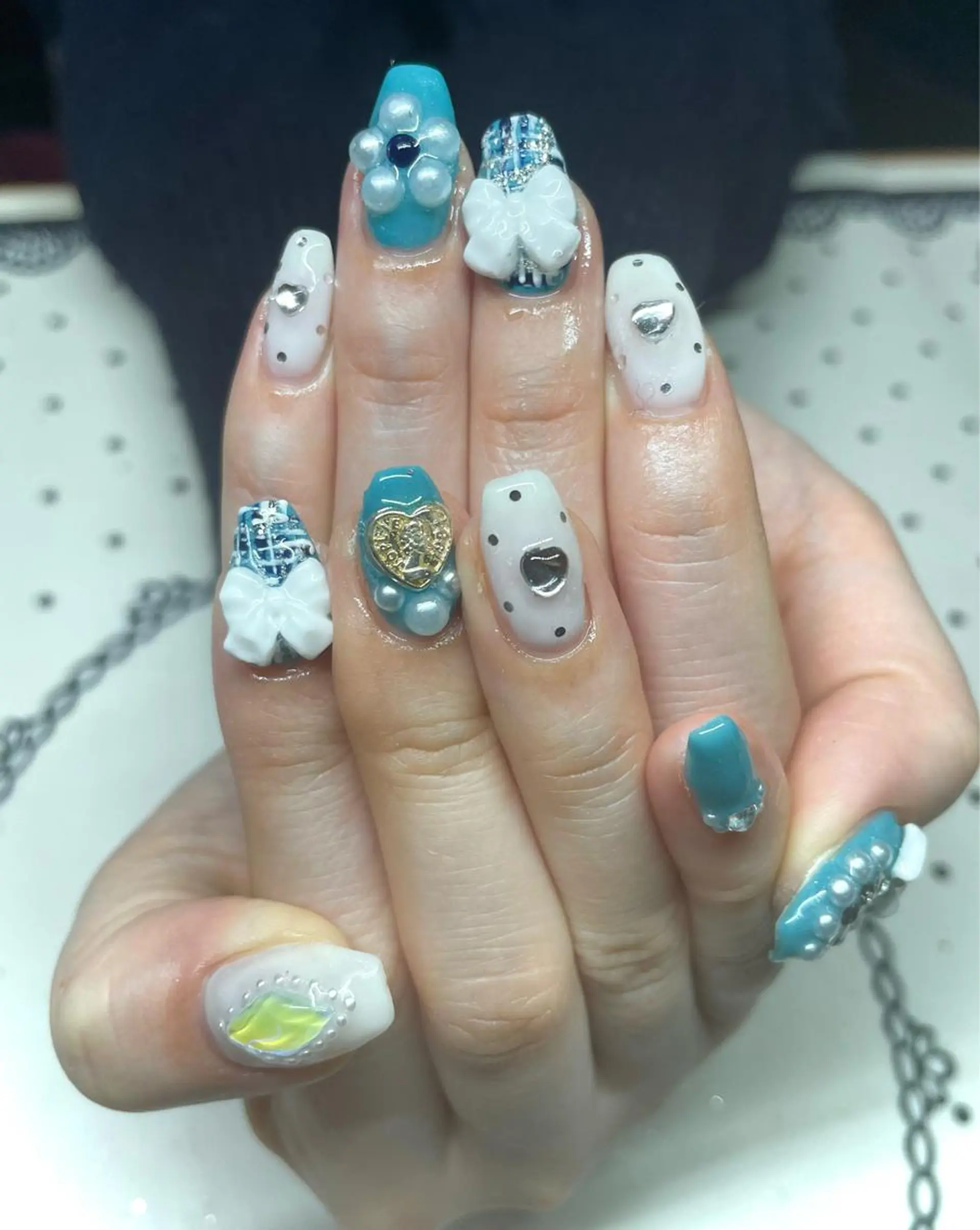 ネイル リボン ハンドネイル nailsalon sugarr所属・nailist cocoのネイルデザイン