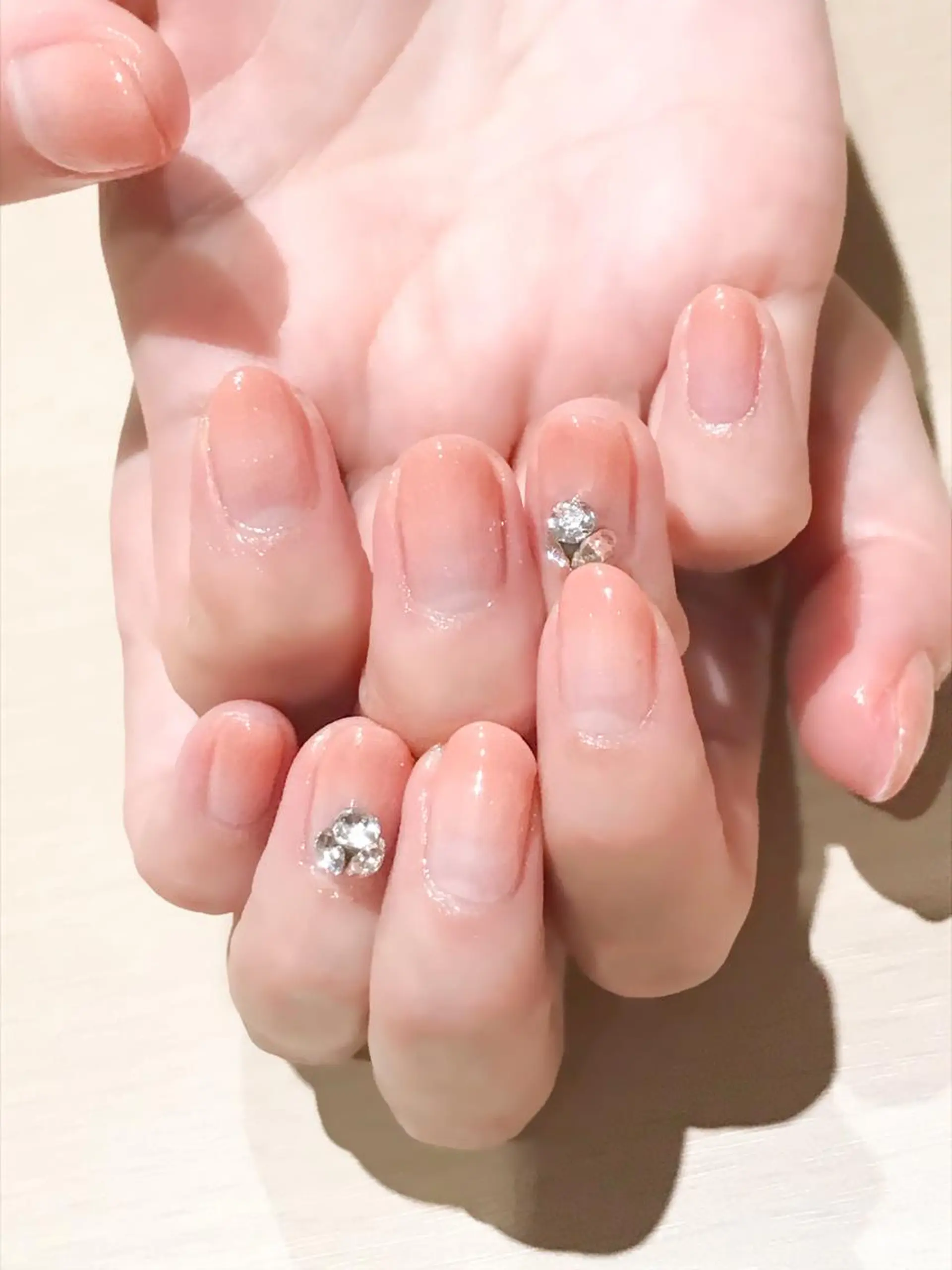ネイル ジェルネイル グラデーション オレンジ 春ネイル ストーンネイル Nyanco Nailのネイルデザイン
