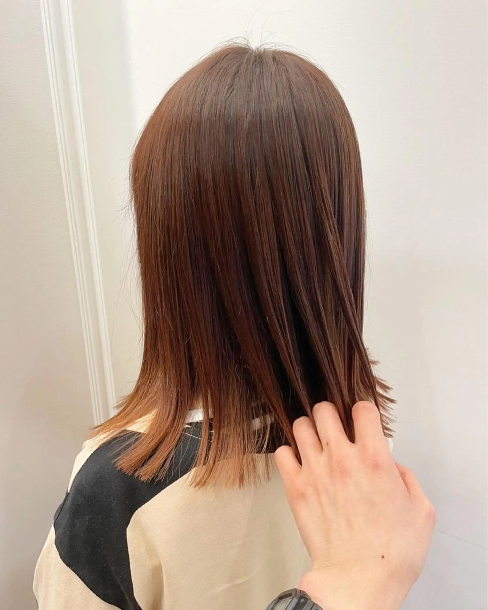 カラー オレンジ ヘアカラー 波巻きウェーブ 韓国風パーマ 纐纈のヘアスタイル