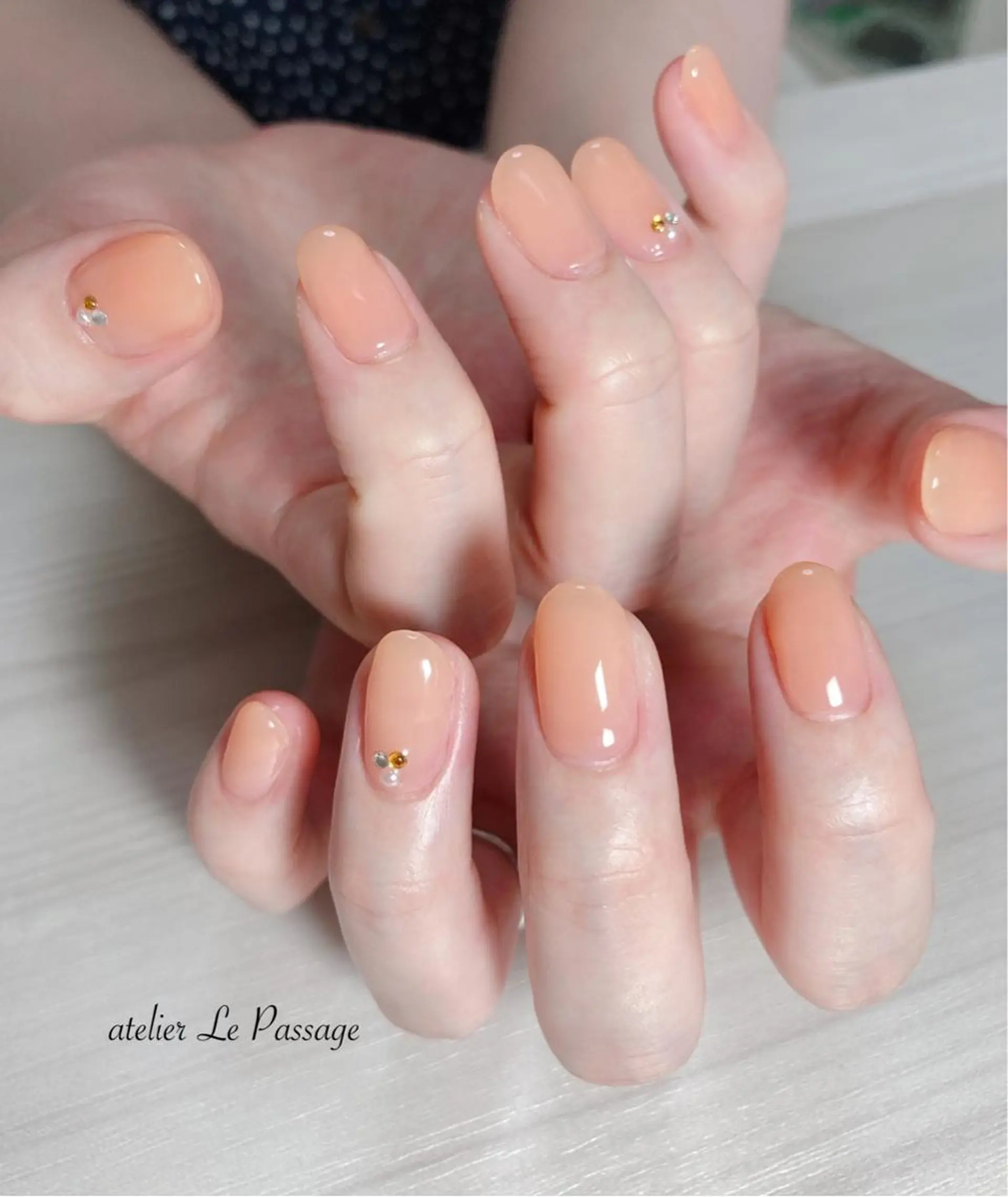 ネイル ジェルネイル オフィスネイル ワンカラーネイル オレンジ パラジェル Atelier Le Passage所属・h nakatsukaのネイルデザイン