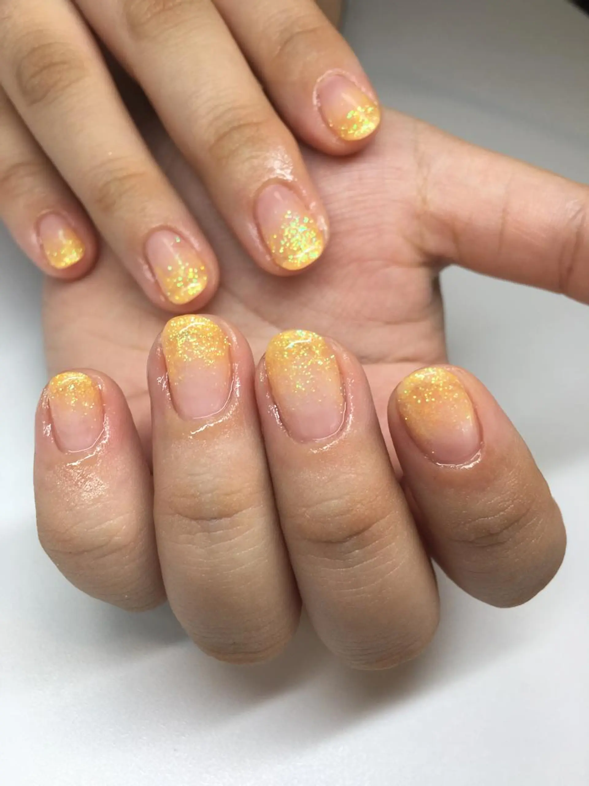 ネイル グラデーション ラメ(グリッター) ラメグラデーション オレンジ 夏ネイル glow_ nailのネイルデザイン